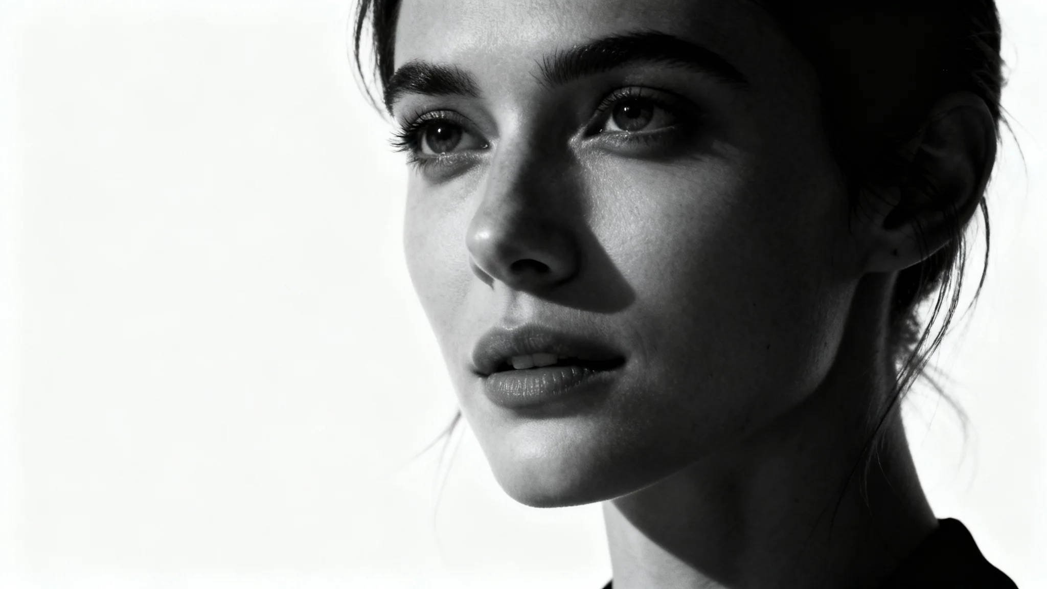 A hyperrealistic, cinematic style portrait of a woman with a thoughtful expression, set against a stark white background. The lighting is dramatic and high-contrast.