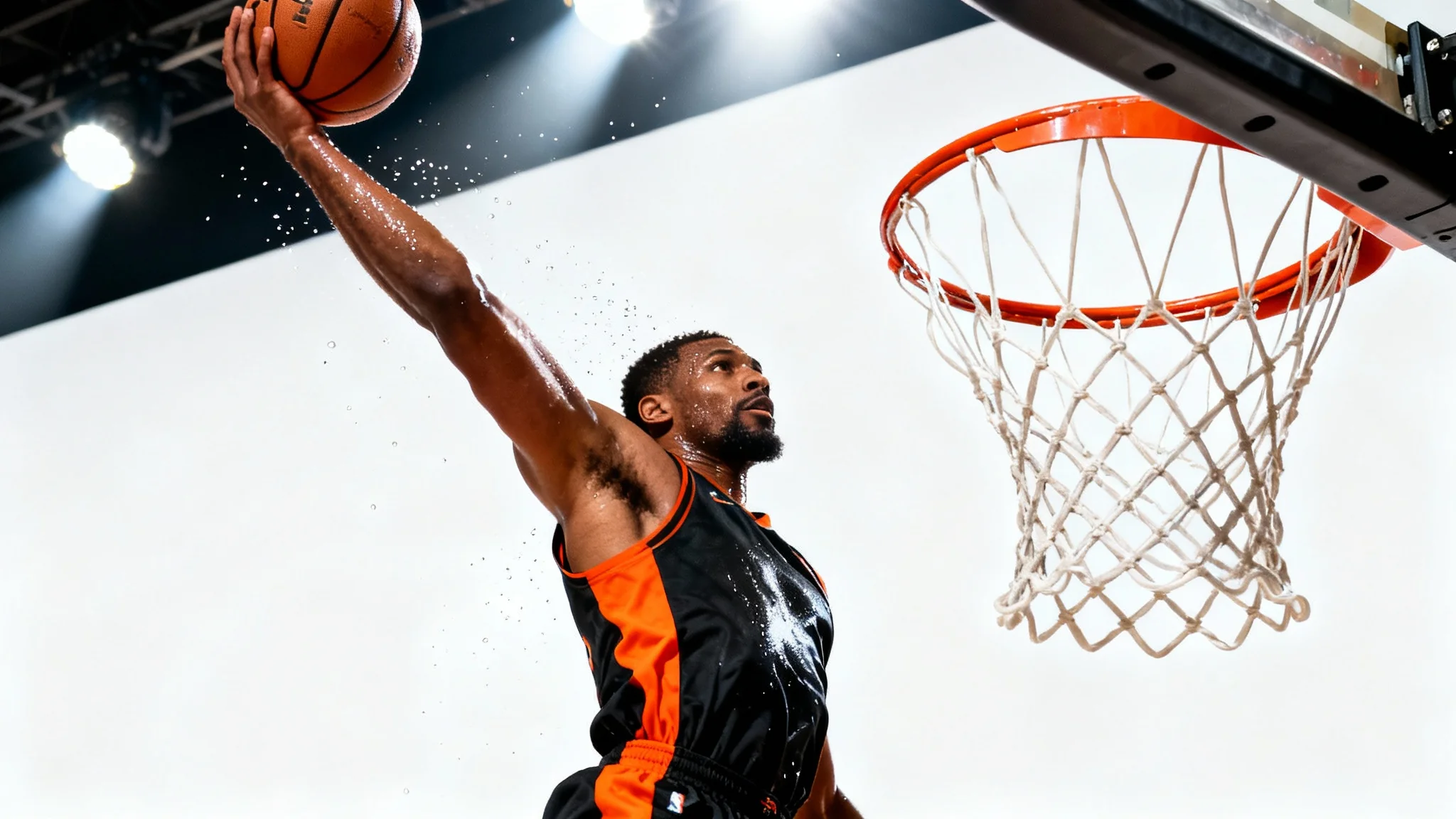 A dynamic action shot of a basketball player in mid-air executing a powerful slam dunk, isolated against a clean white background to showcase the quality of a basketball photo editor.