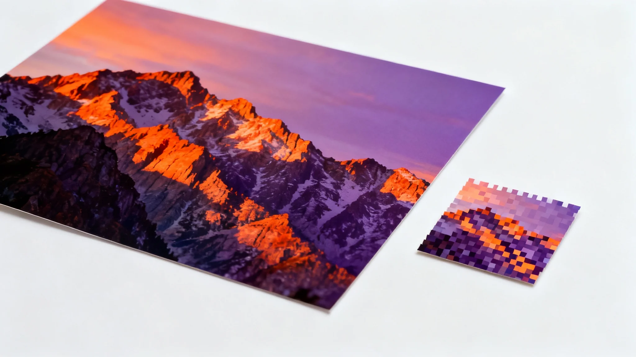A conceptual image showing a small, pixelated photo of a mountain sunset next to a large, high-quality, crisp print of the same image, representing image resizing for printing.