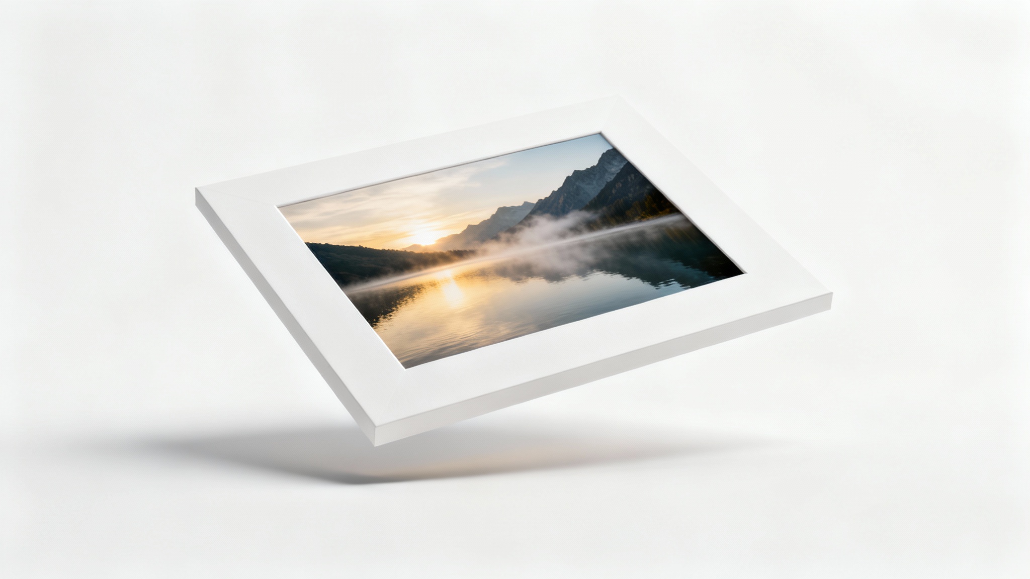 A mockup of a landscape photo of a mountain lake, framed with a clean white border and casting a soft shadow against a plain white background.