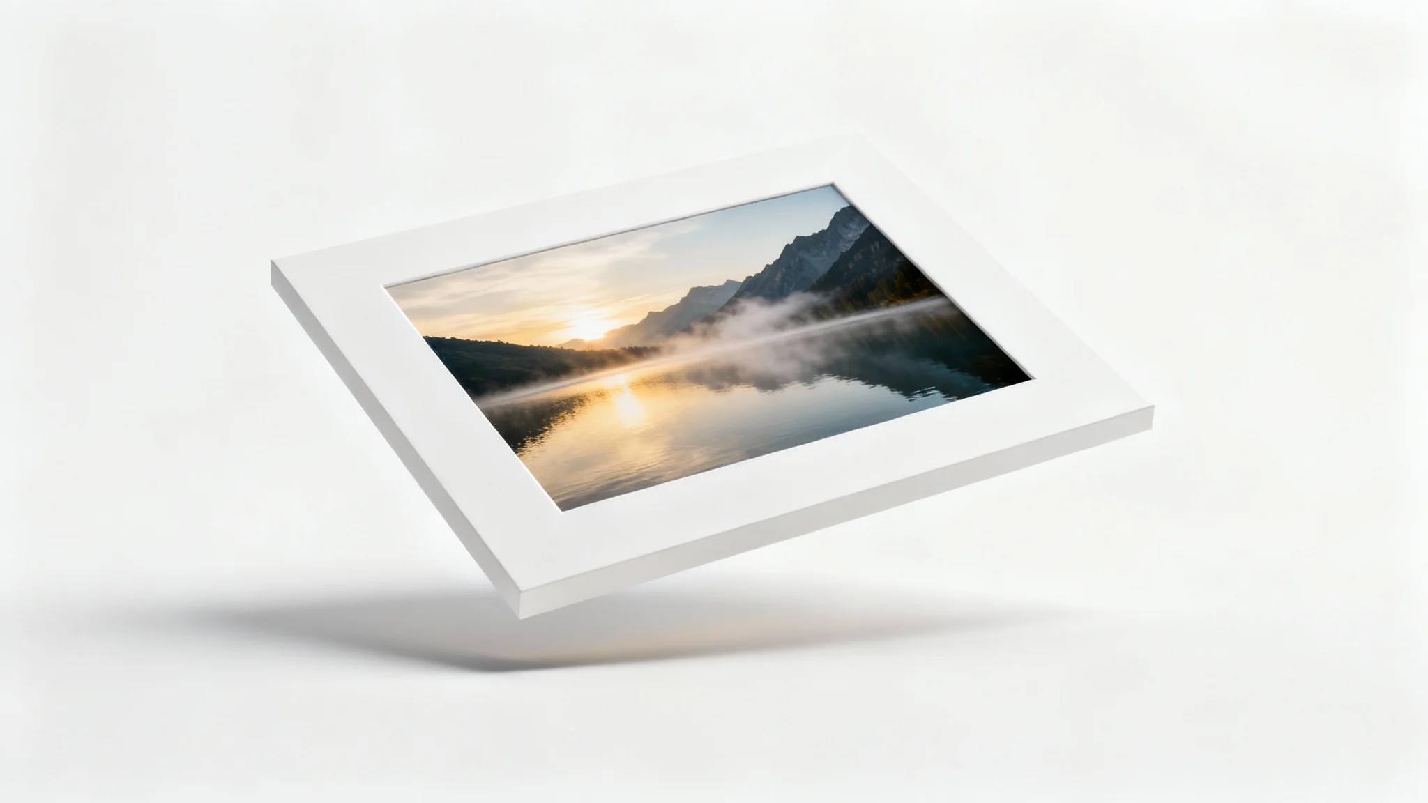 A mockup of a landscape photo of a mountain lake, framed with a clean white border and casting a soft shadow against a plain white background.