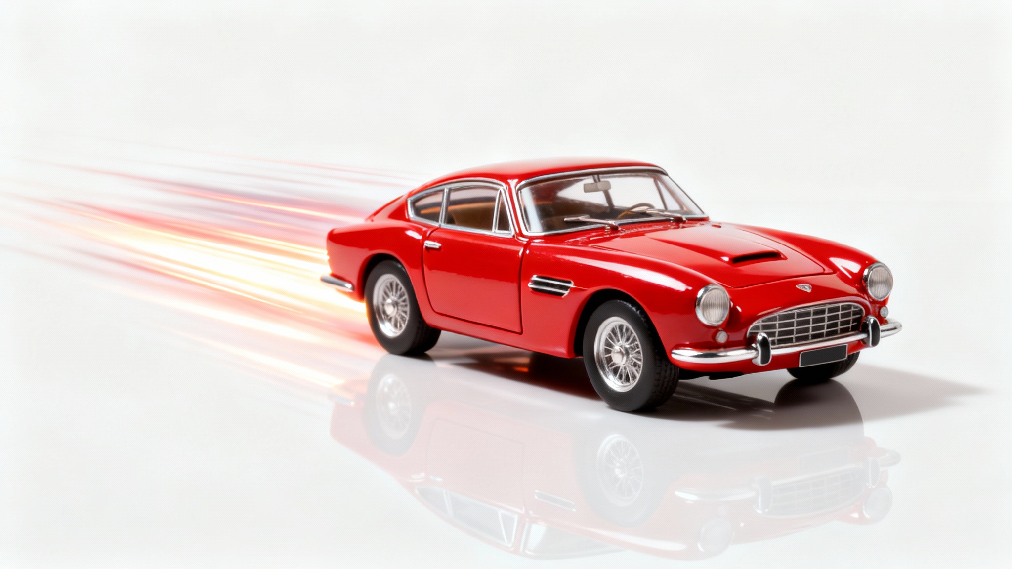 A professionally edited studio photograph of a red vintage toy car on a white background, with dynamic light and motion effects added to make it look like it's speeding.