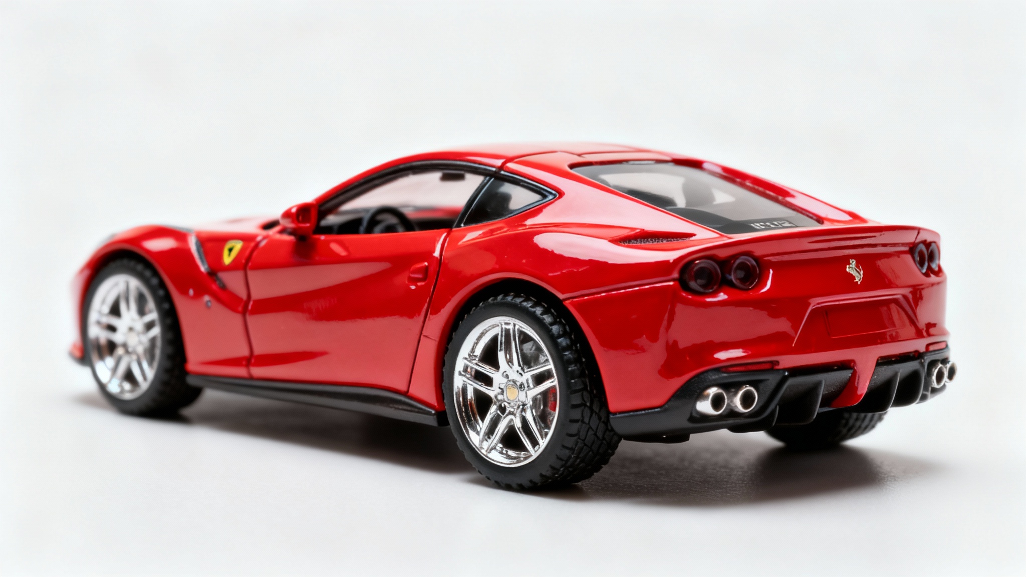 A professionally edited, high-quality photograph of a red toy sports car sitting on a clean white background, looking like a commercial product shot.