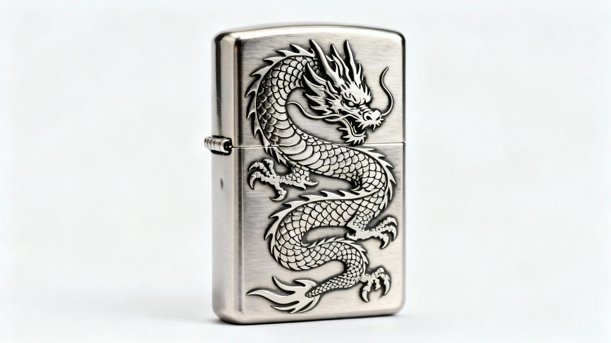 A photorealistic mockup of a brushed chrome Zippo lighter featuring a detailed laser engraving of a dragon, presented in a clean studio setting against a white background.