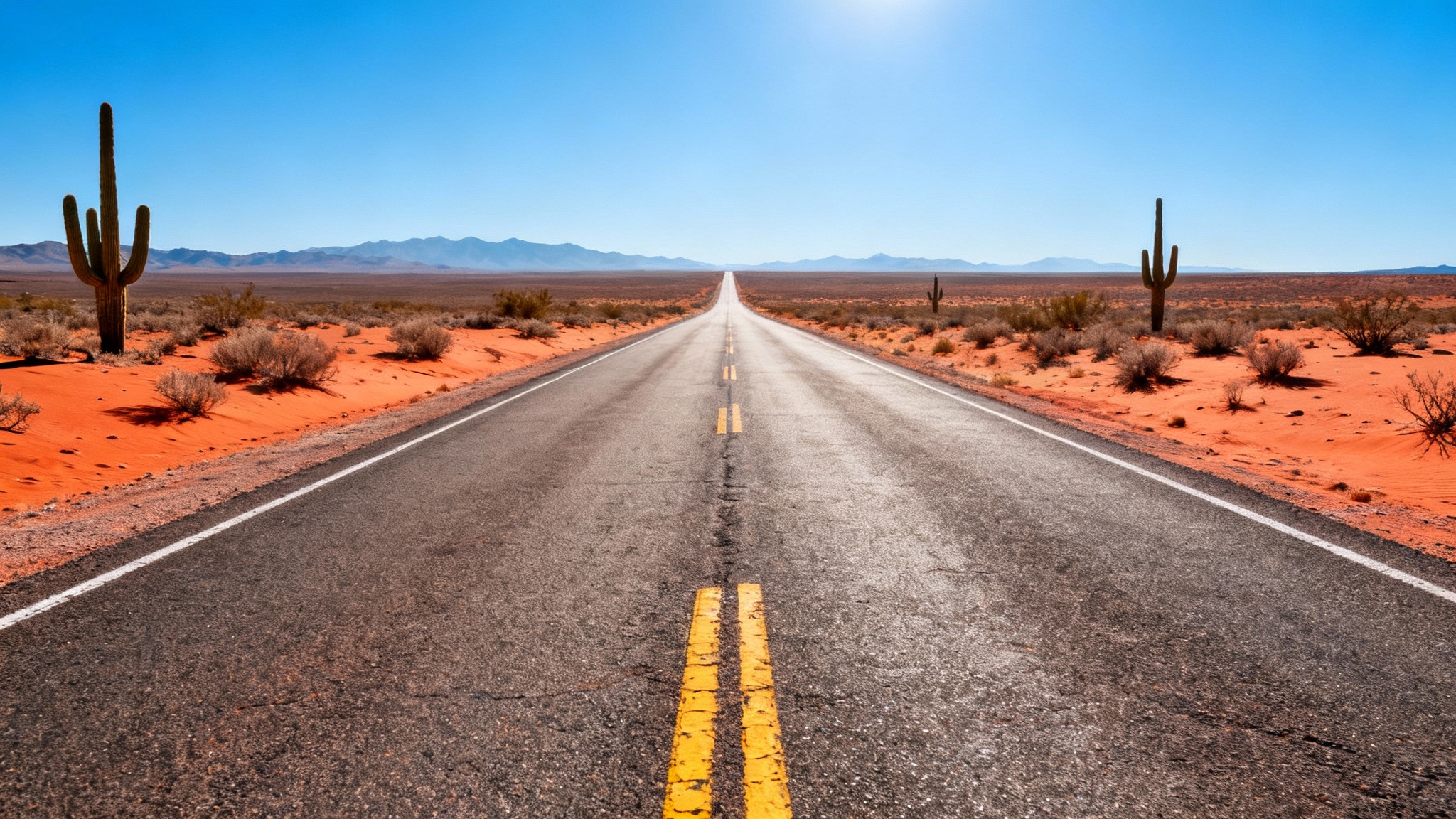 A photorealistic image of an empty two-lane road stretching endlessly through a vast desert with saguaro cacti under a clear blue sky.