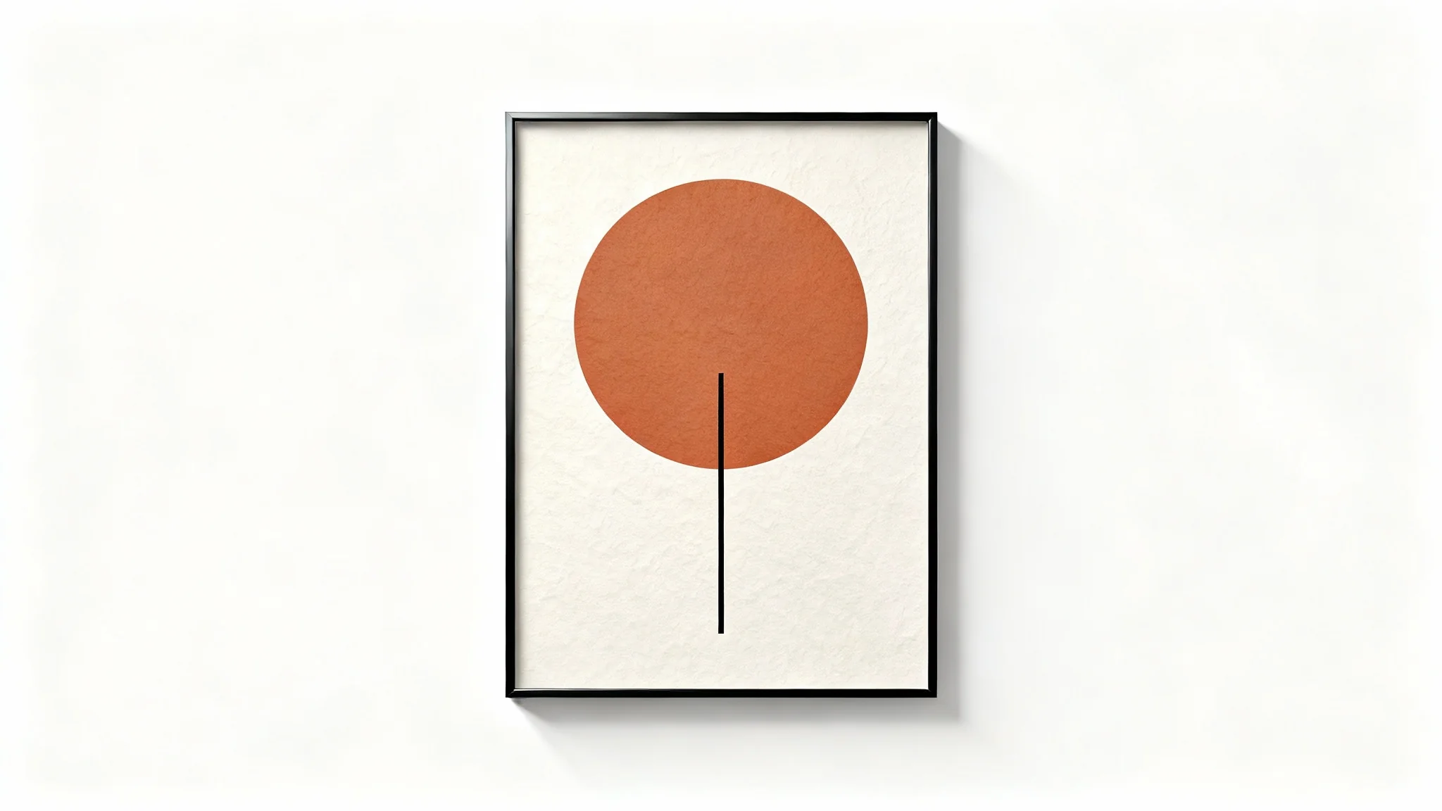 A framed piece of modern minimalistic art hangs against a stark white background. The artwork consists of a simple design with a terracotta-colored circle and a thin black line.