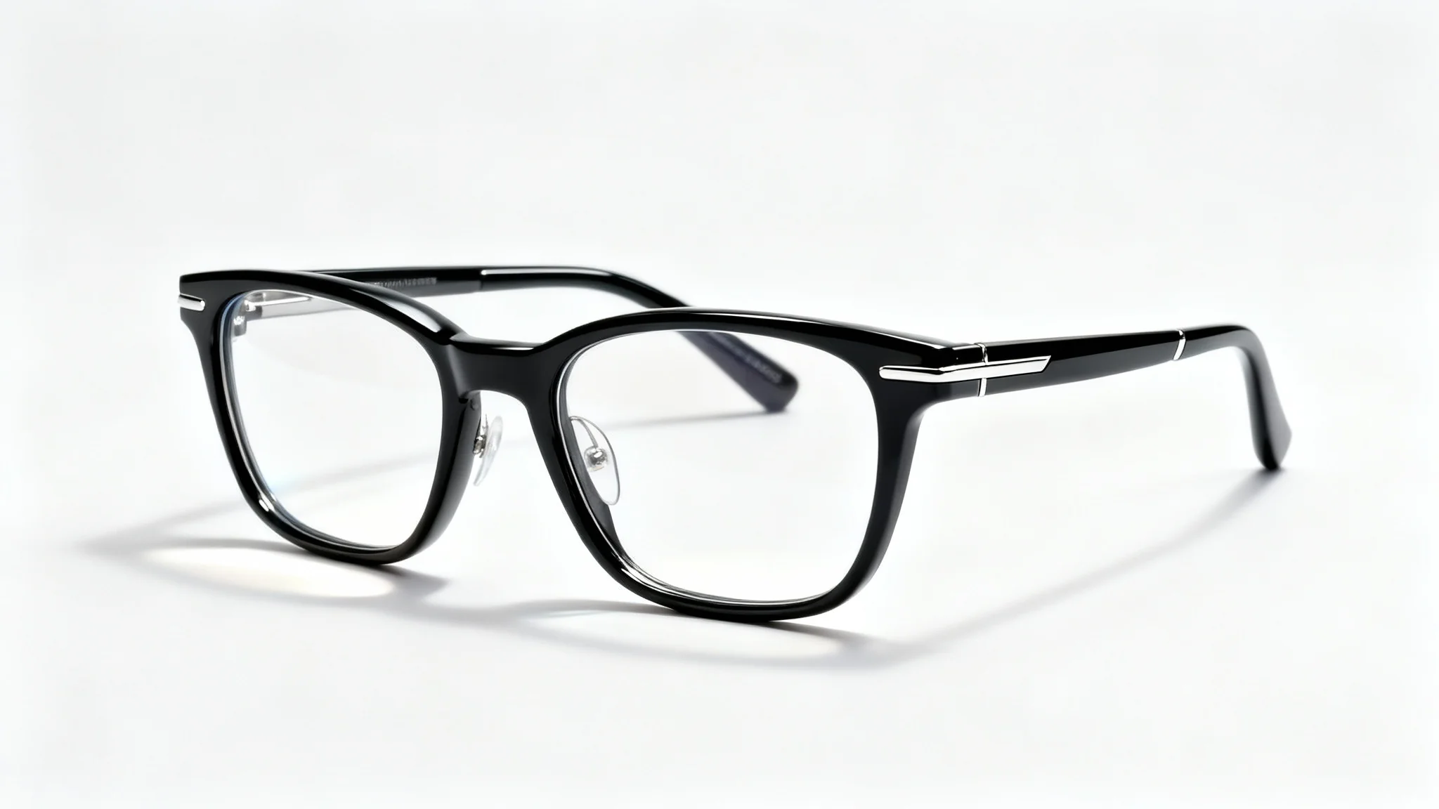 A photorealistic image of a pair of modern, black-framed eyeglasses with clear lenses, displayed at an angle on a plain white background.