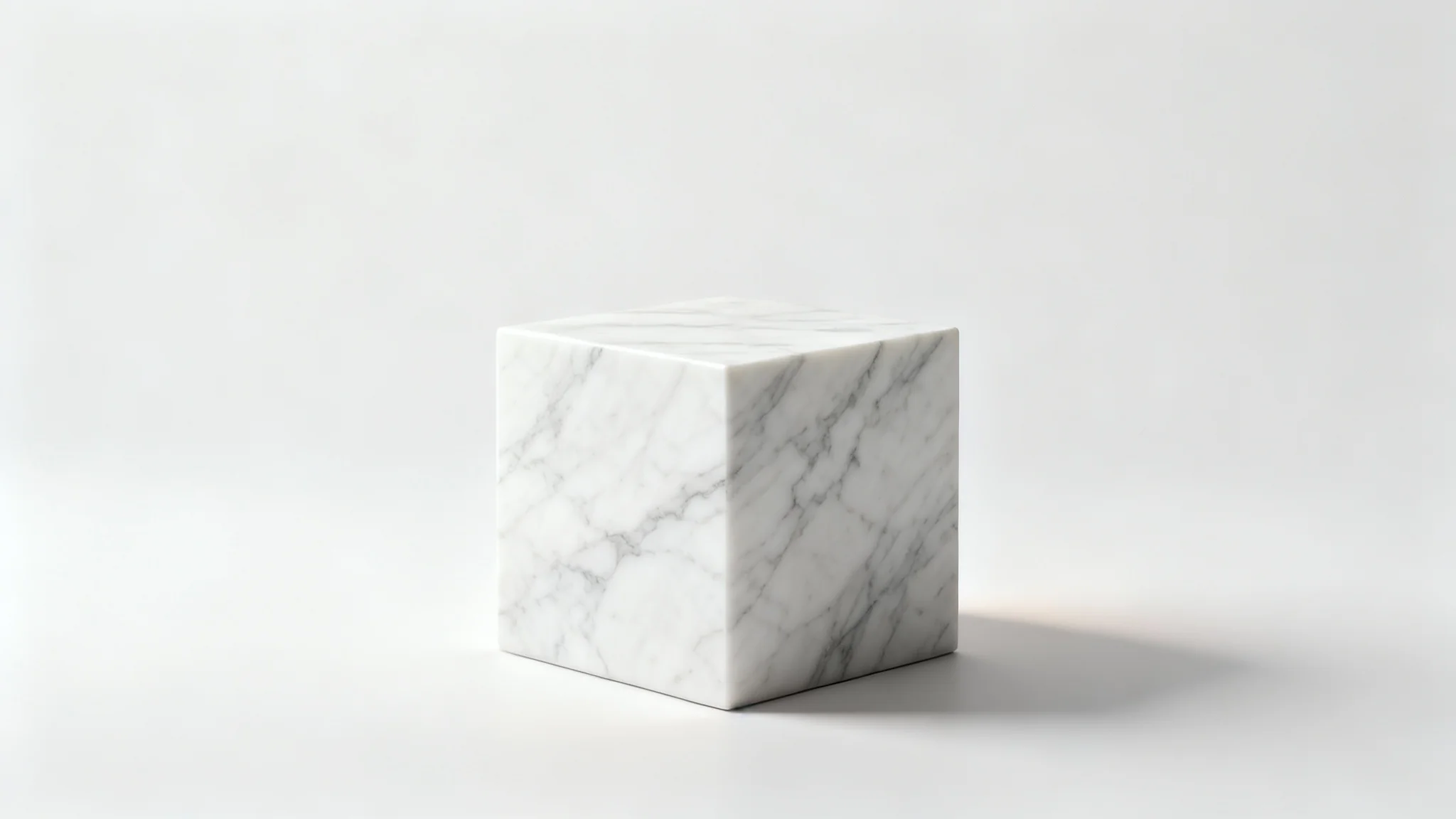 A photorealistic mockup of a single, cube-shaped white marble product pedestal on a seamless white background, lit softly from the side.
