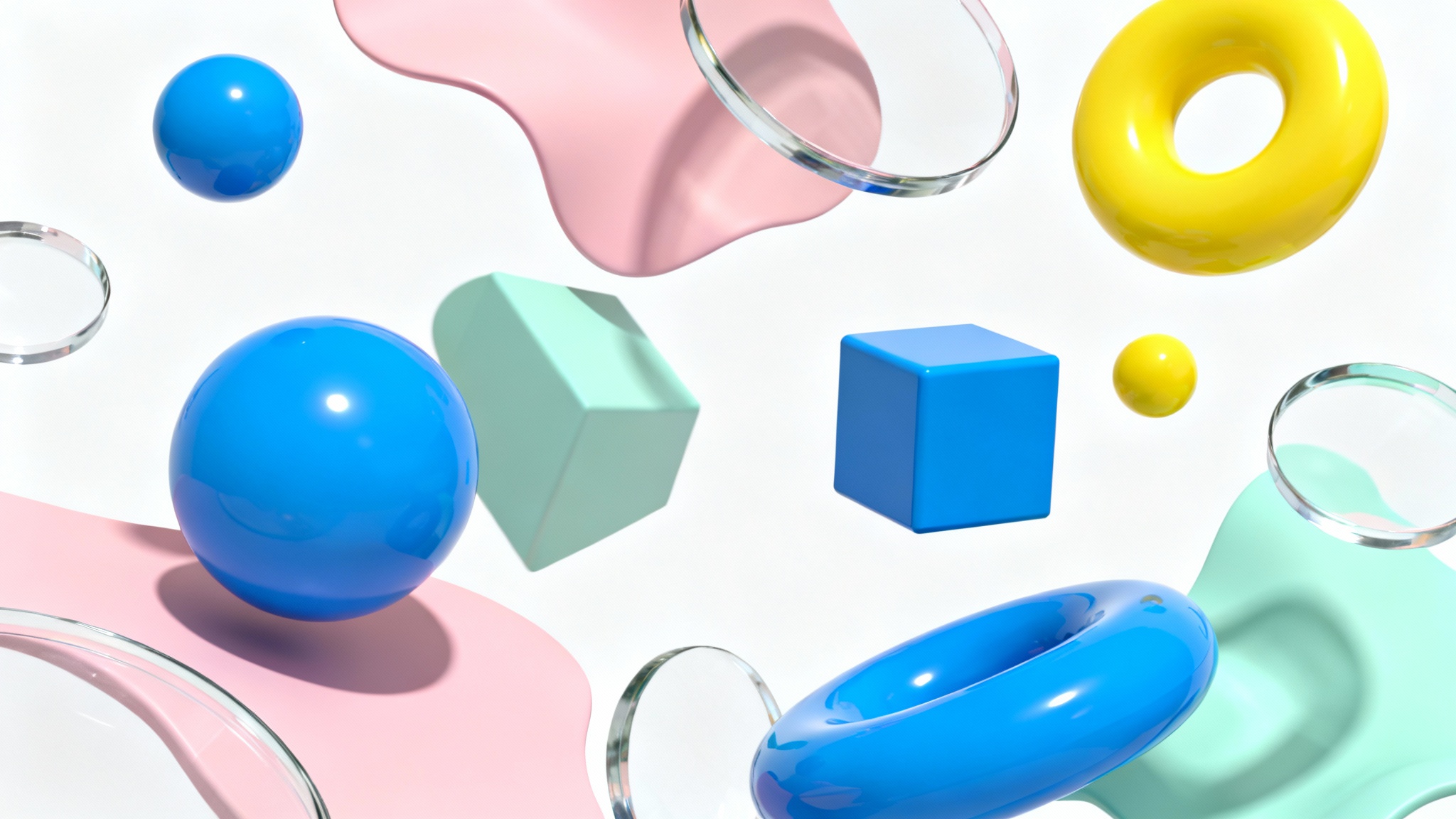 A collection of colorful 3D geometric and organic shapes floating against a white background, demonstrating modern 3D object rendering.