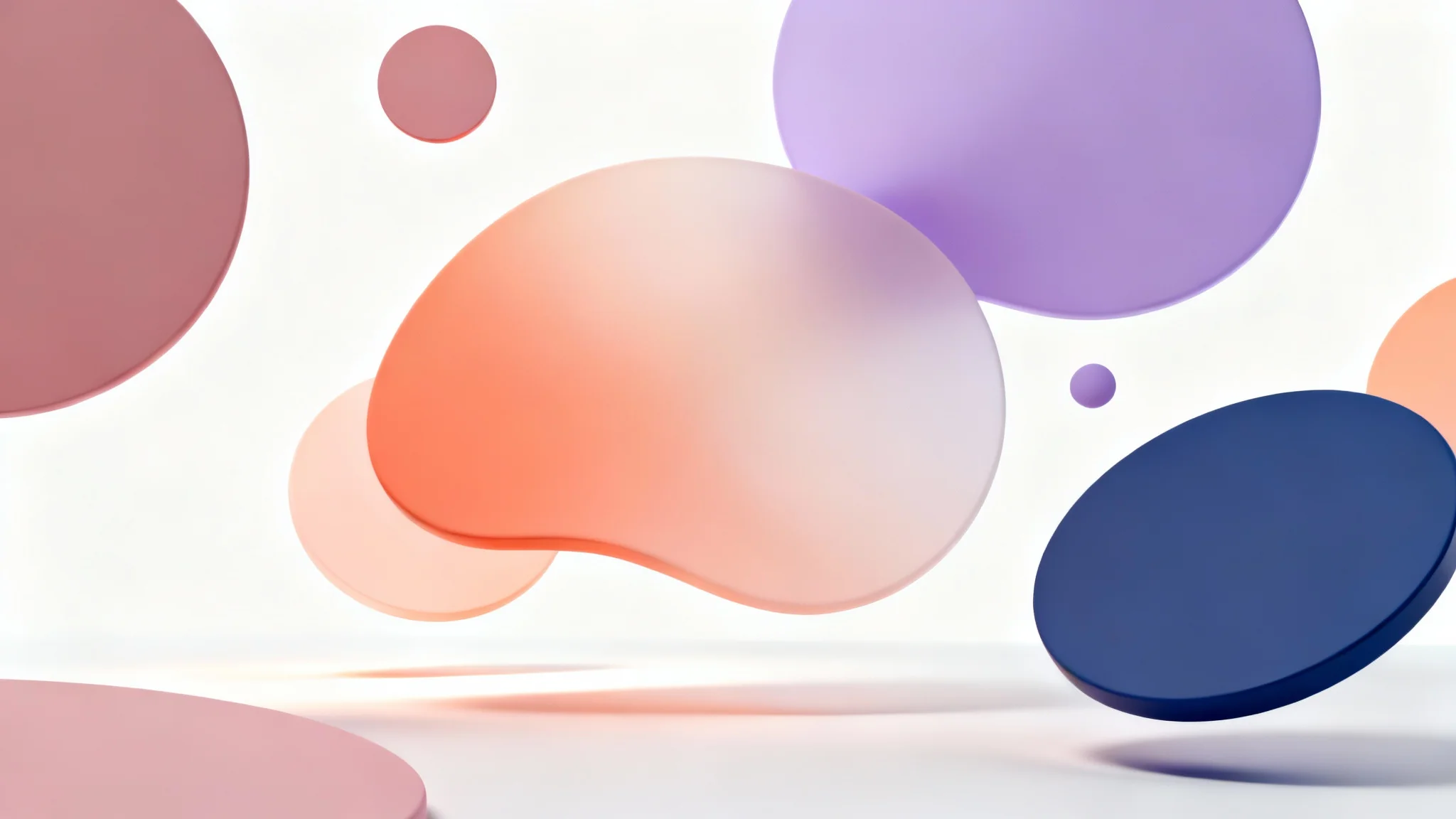 An abstract image demonstrating color harmony, featuring overlapping geometric and organic shapes in a soft palette of pink, orange, and purple, arranged neatly on a white background.