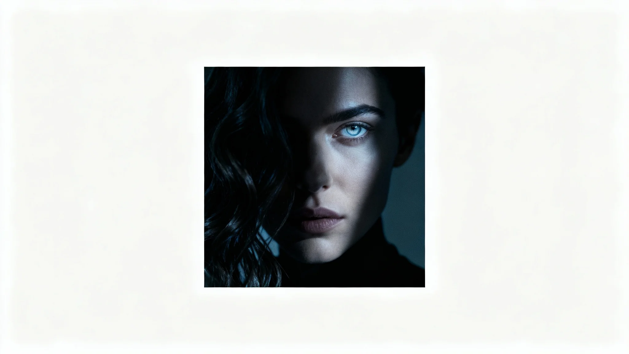 A mockup of a dark aesthetic profile picture, featuring a close-up of a mysterious person's face half-obscured by shadow and hair, isolated on a white background.