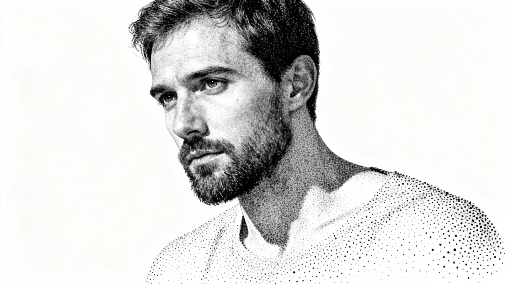 A detailed, black and white stipple portrait of a man with a beard. The image is created entirely from tiny dots, demonstrating the artistic technique against a clean white background.
