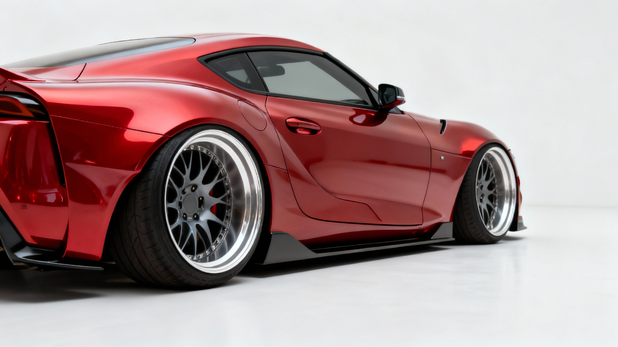 A photorealistic image of a glossy red sports car with a lowered suspension, shown from the side in a clean white studio.
