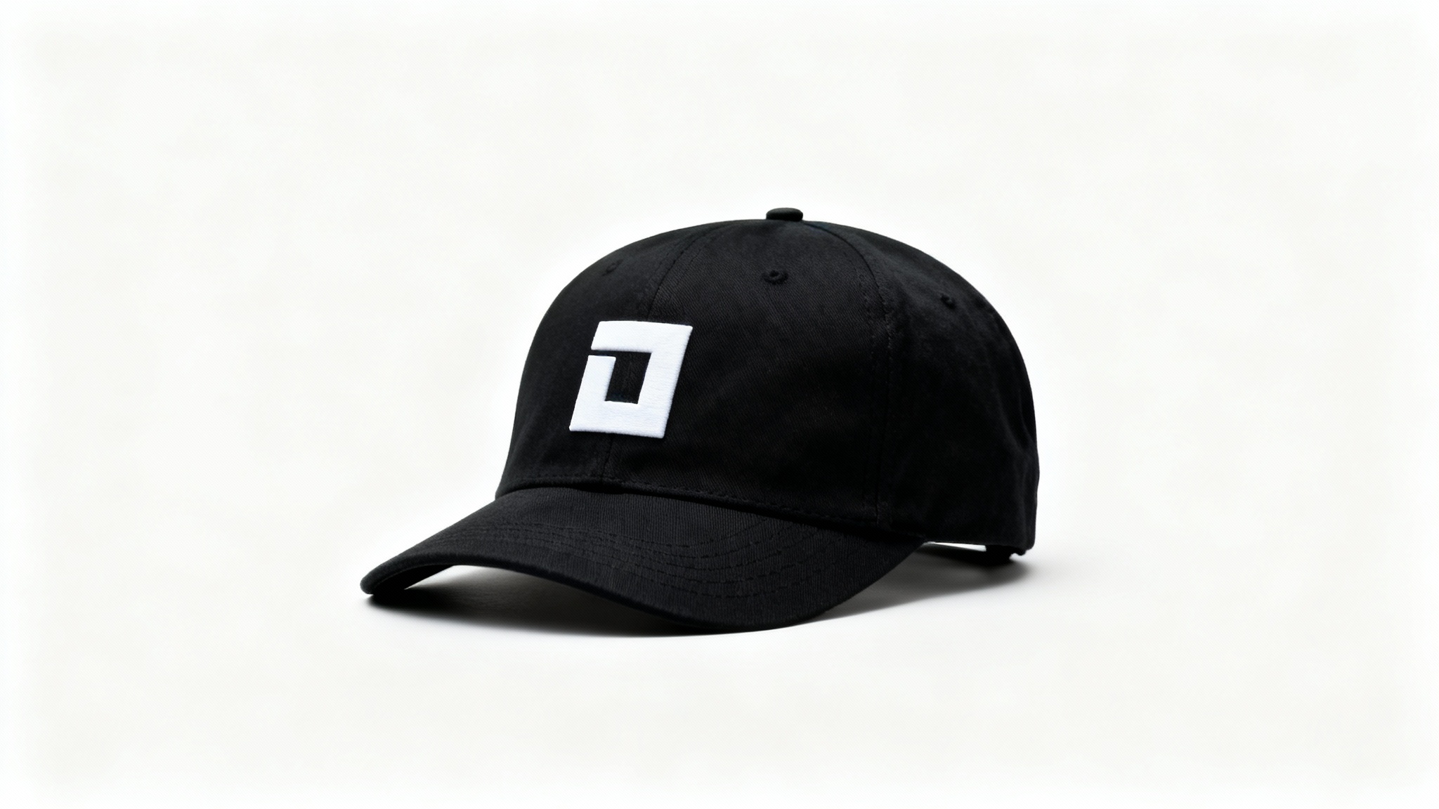 A photorealistic mockup of a black snapback cap with a minimalist white geometric logo embroidered on the front, set against a clean white background.