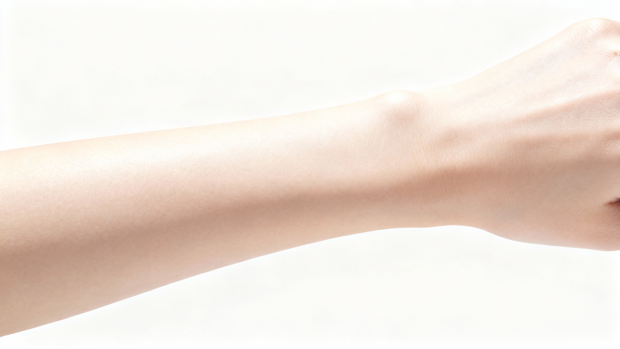 A close-up photograph of a person's forearm with smooth, clear, and healthy-looking skin, set against a clean white background.