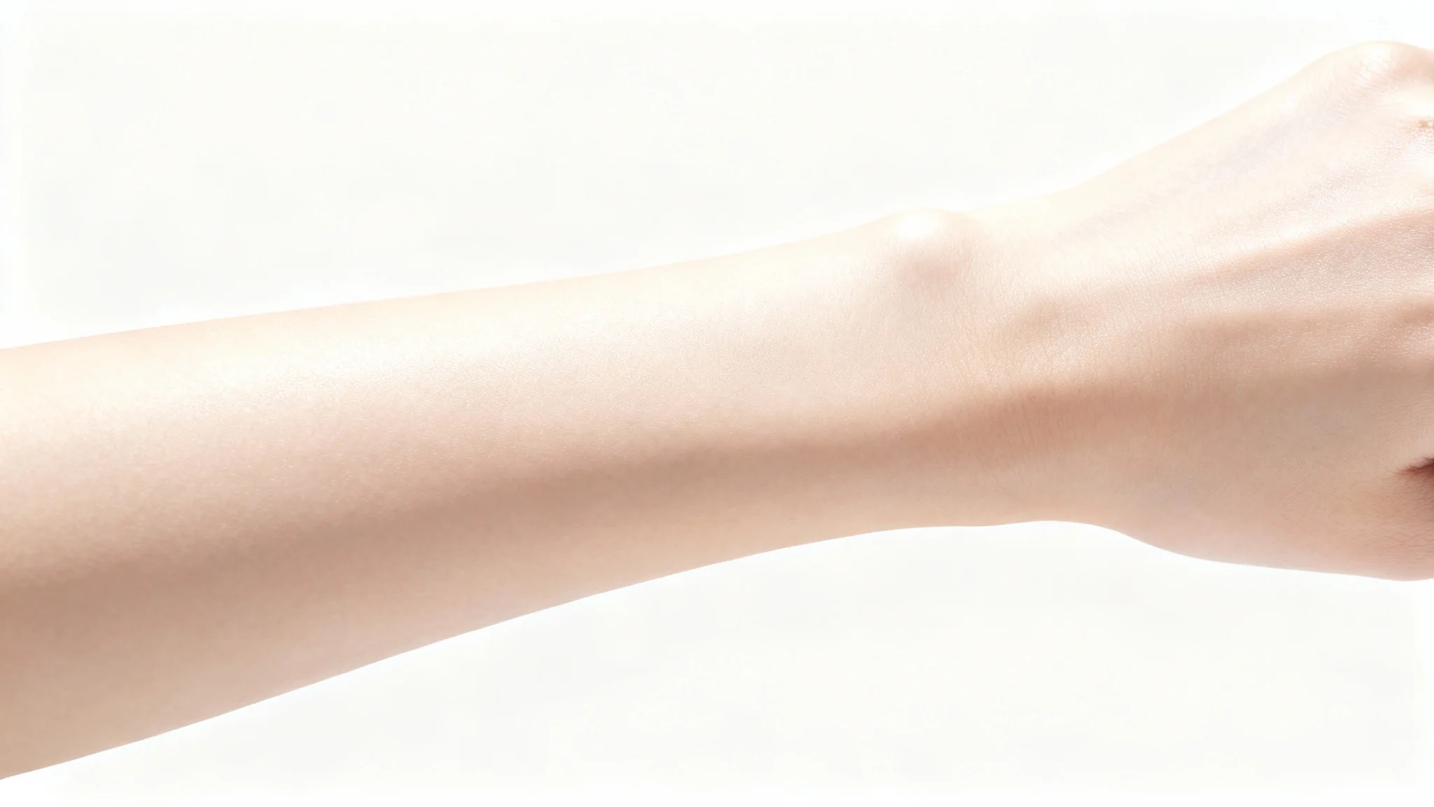 A close-up photograph of a person's forearm with smooth, clear, and healthy-looking skin, set against a clean white background.