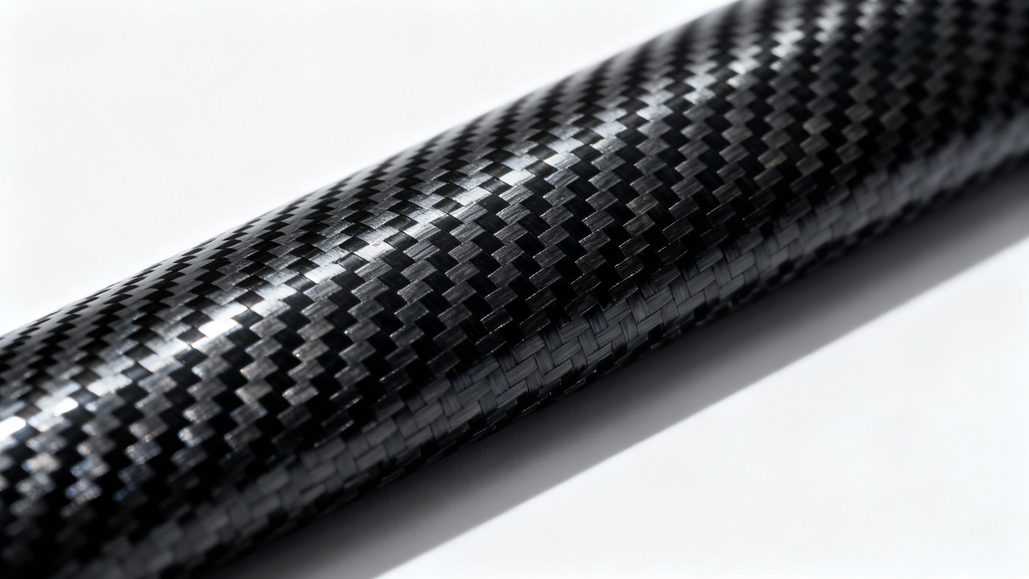 A detailed, high-resolution image of a black carbon fiber texture, showing its glossy, woven pattern with realistic lighting and shadows, on a white background.