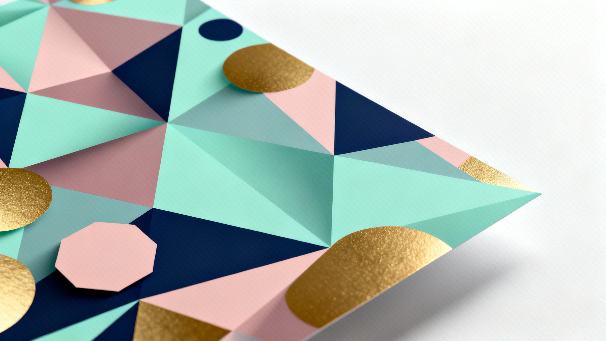 A modern geometric background featuring an abstract pattern of overlapping triangles and hexagons in mint green, dusty rose, and navy blue, with gold accents, displayed against a clean white background.