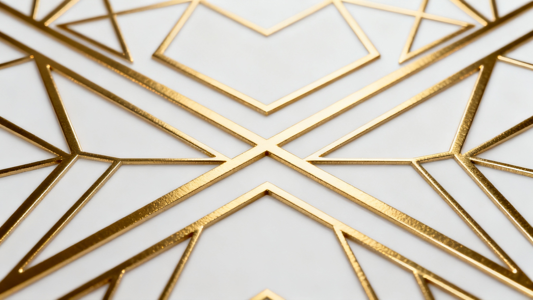 An elegant background featuring a modern geometric pattern of sharp, metallic gold lines interlocking on a clean white surface, creating a luxurious and sophisticated design.