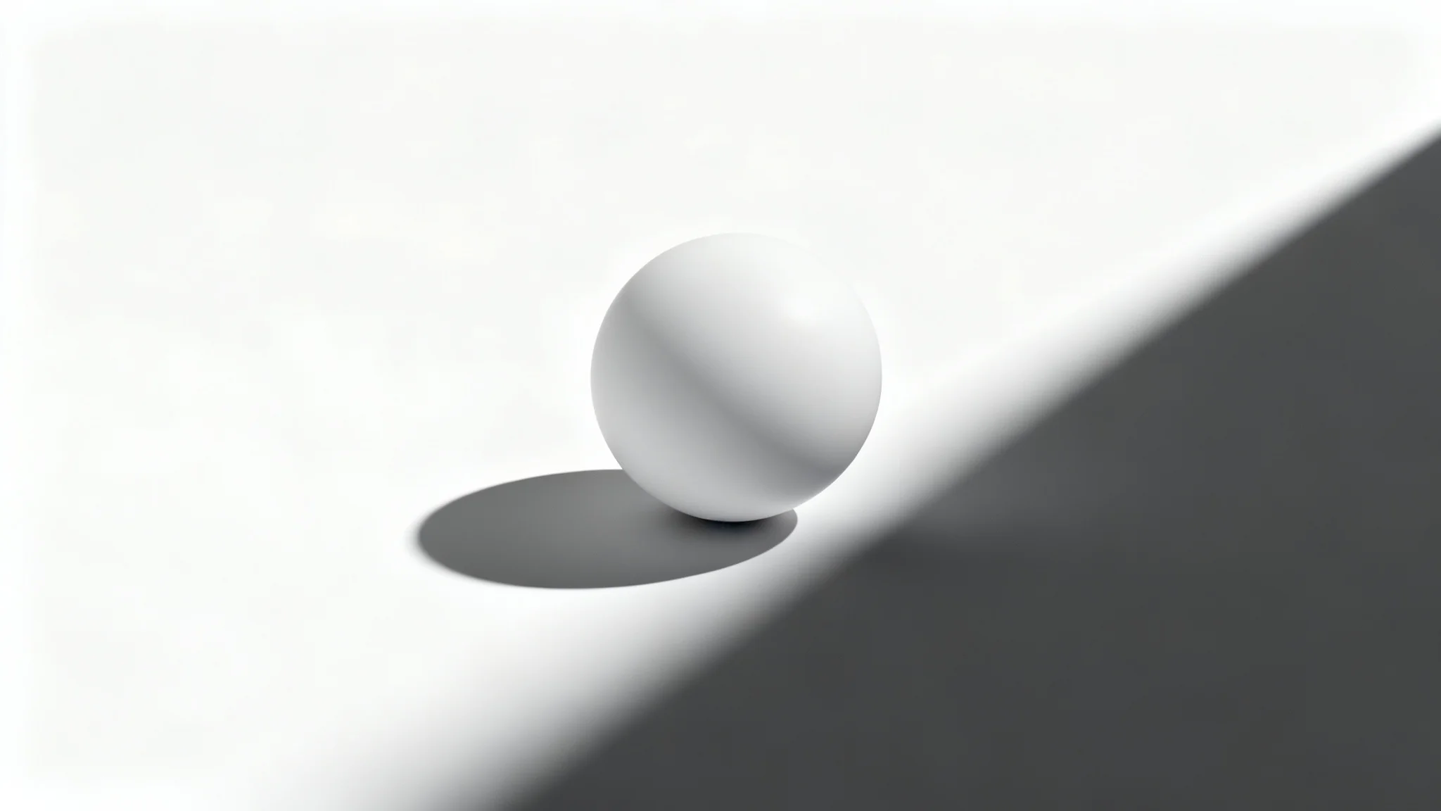 A modern white sphere on a white surface, casting a long, sharp, and dramatic shadow, illustrating the effect of adding a shadow to an object.