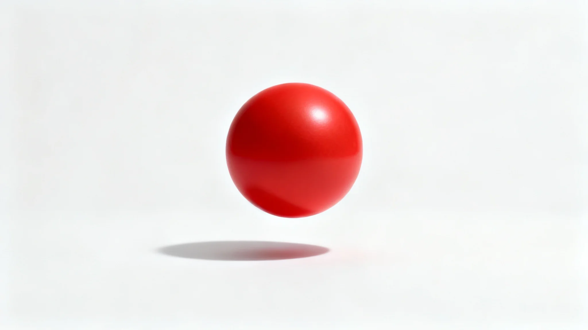A red sphere hovering over a white surface, casting a distinct and soft shadow, illustrating an add shadow effect.