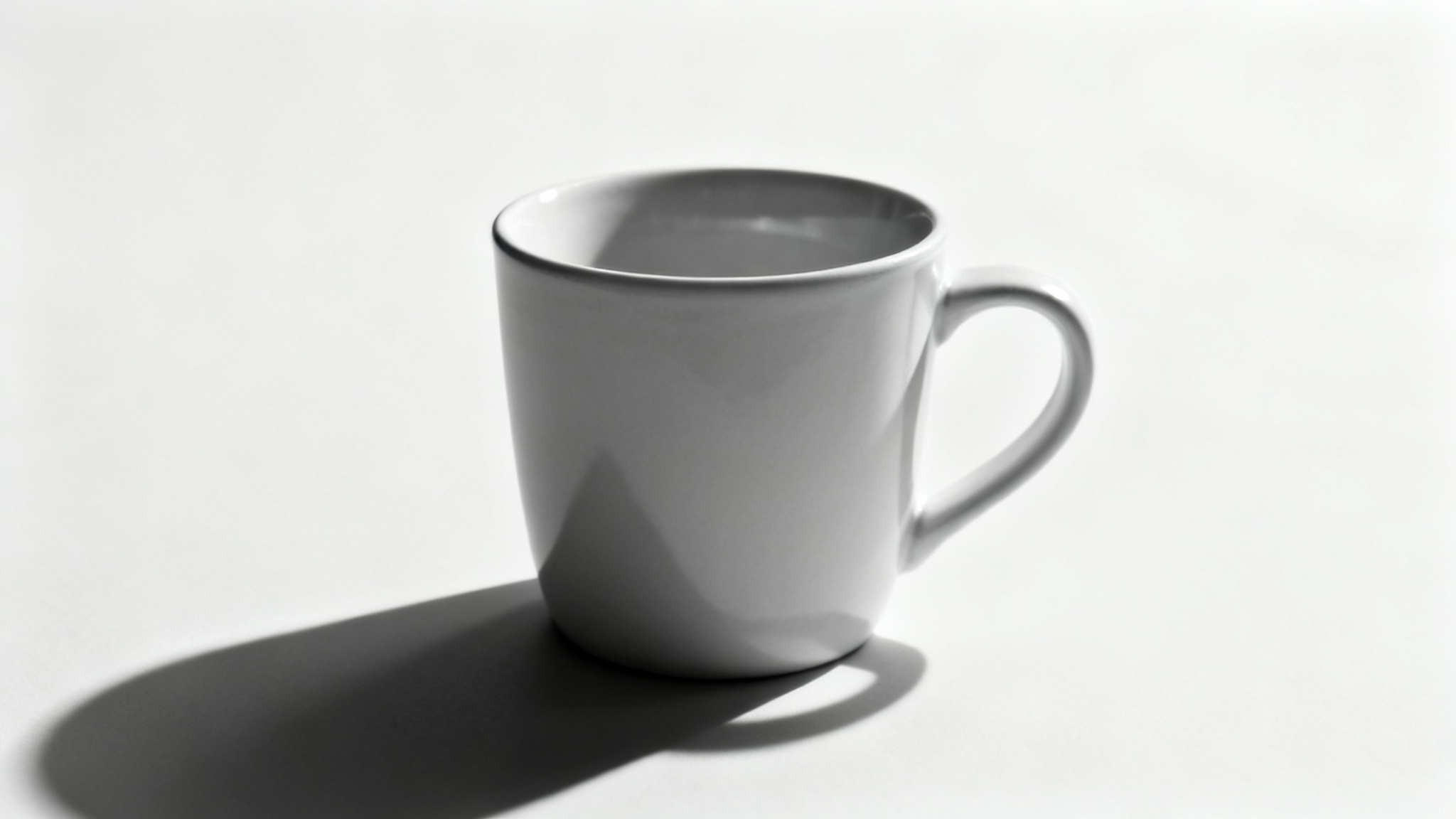 A photorealistic image of a ceramic mug on a white background, casting a soft, realistic shadow that makes it look three-dimensional.