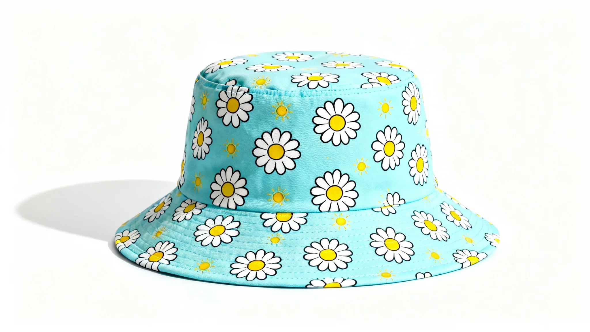 A stylish, light blue bucket hat with a pattern of cartoon daisies and suns, shown in a clean product shot on a white background.