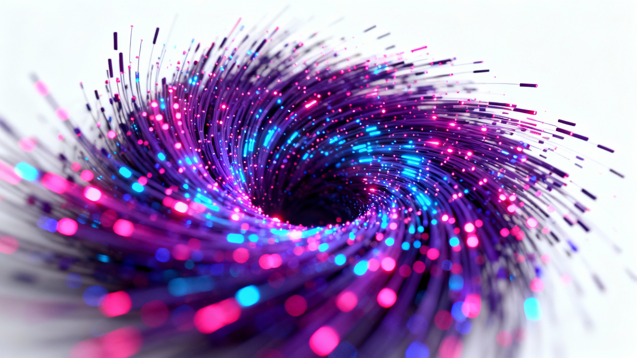 A dynamic swirl of glowing digital particles in vibrant shades of blue, purple, and magenta, captured mid-motion against a plain white background.