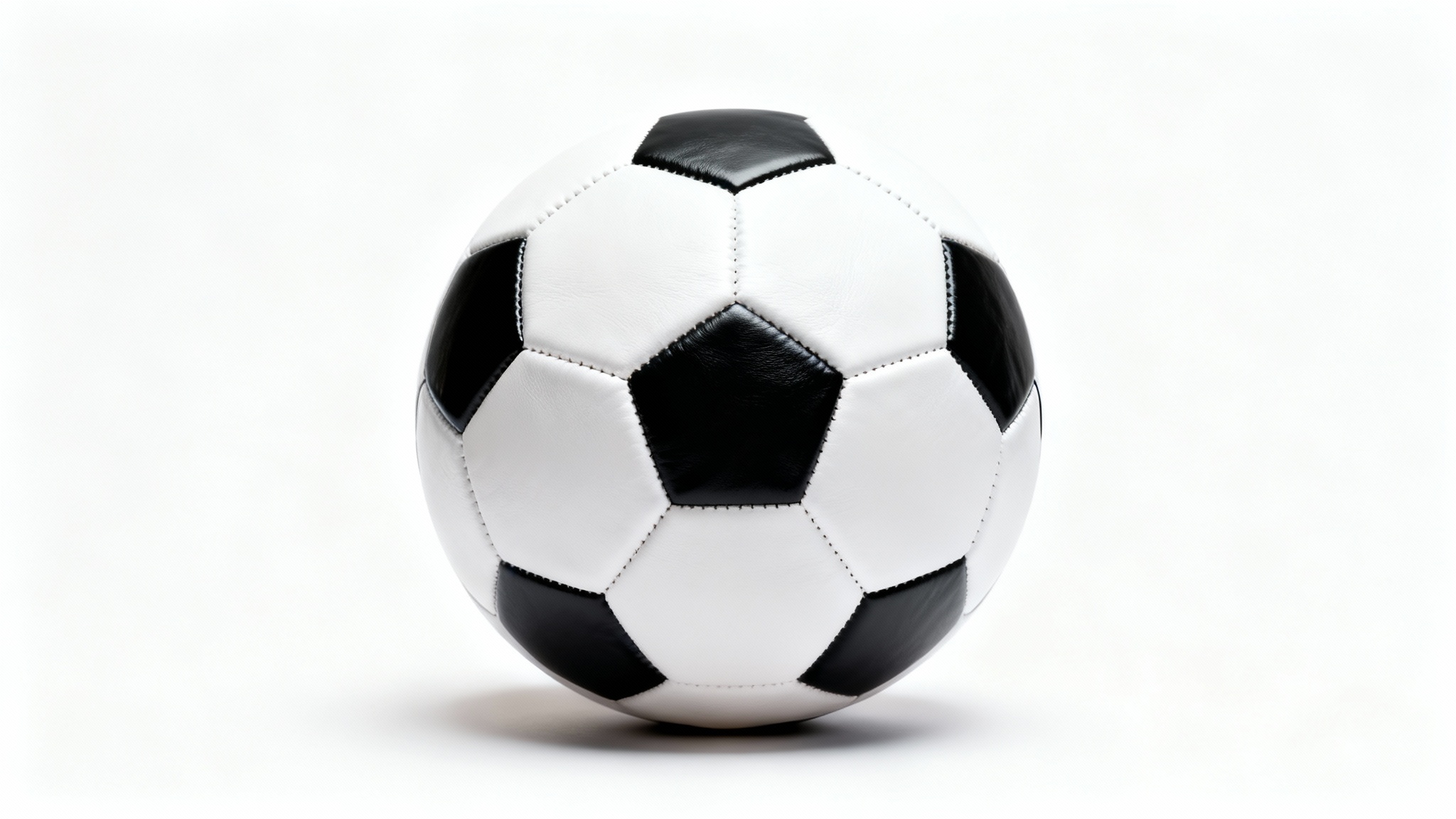 A photorealistic mockup of a classic black and white soccer ball, presented in a clean studio setting with a white background.