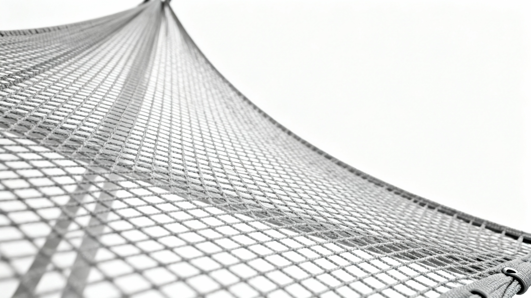 A detailed macro shot of a light gray technical mesh fabric, highlighting its intricate grid pattern and texture against a solid white background.