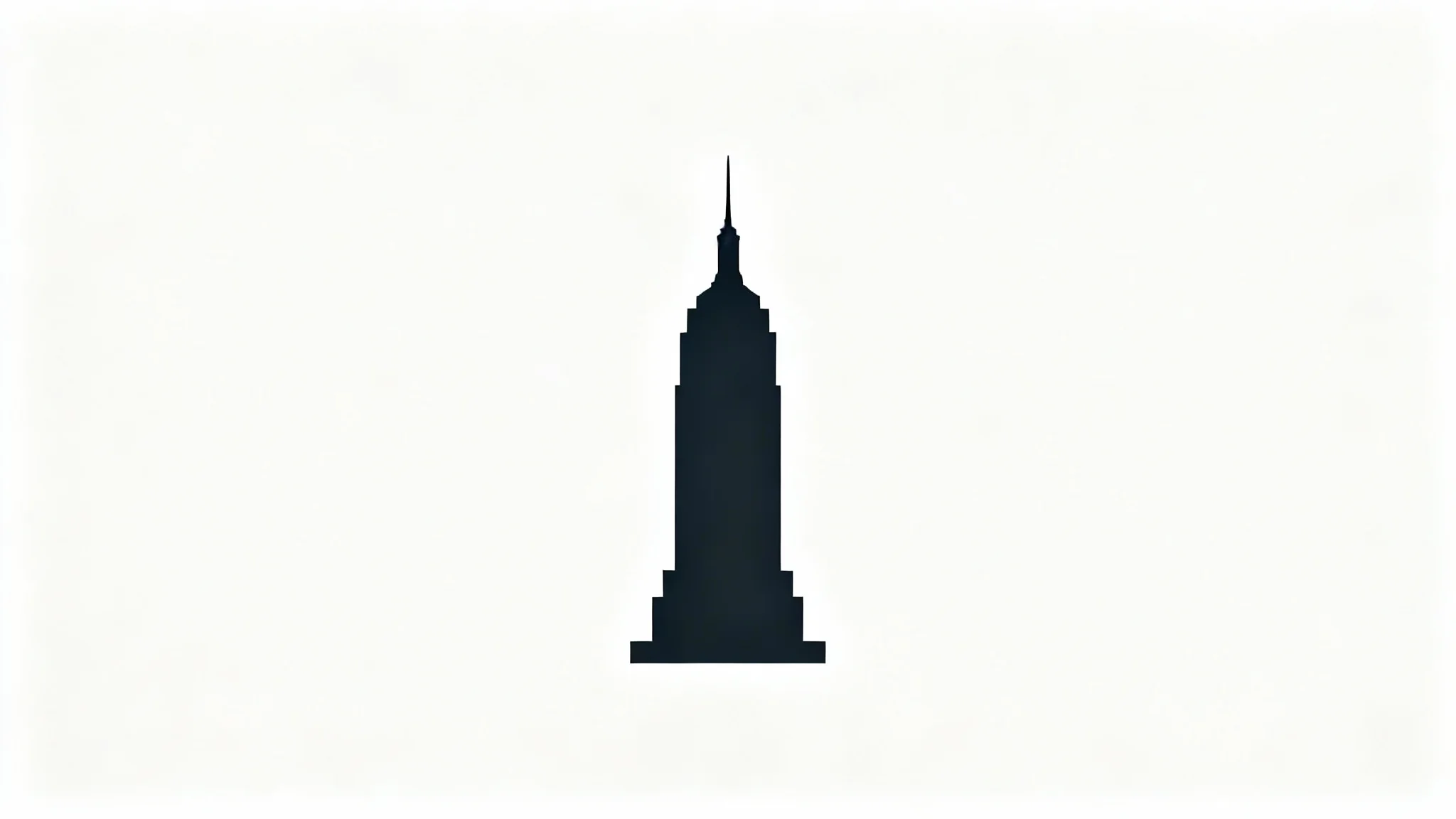 A minimalist, dark gray silhouette icon of the Empire State Building on a clean white background.