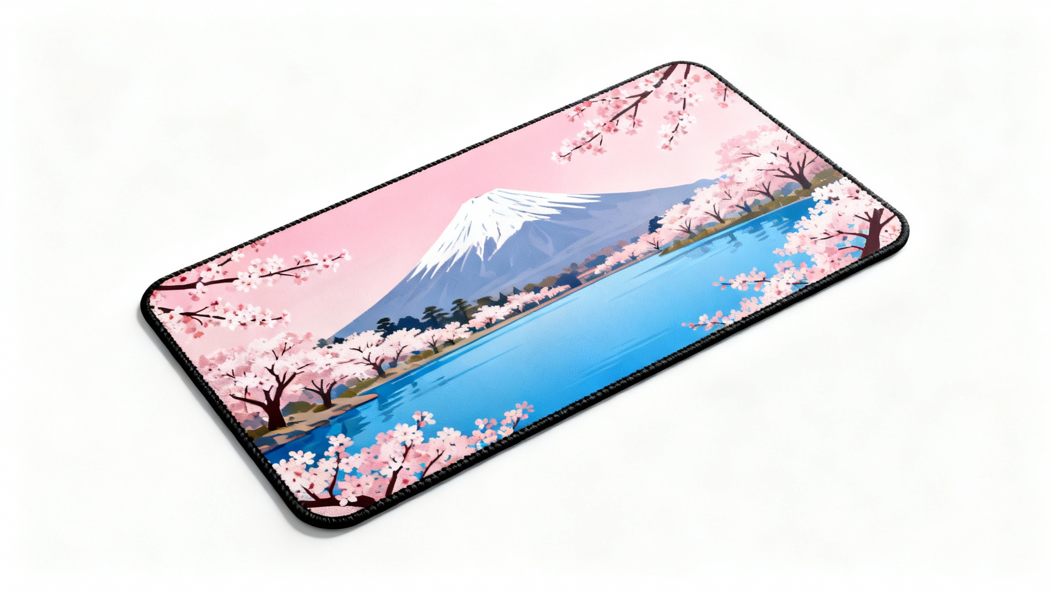 A mockup of an extended mousepad featuring a beautiful Japanese landscape design with cherry blossoms and Mount Fuji, presented on a clean white background.