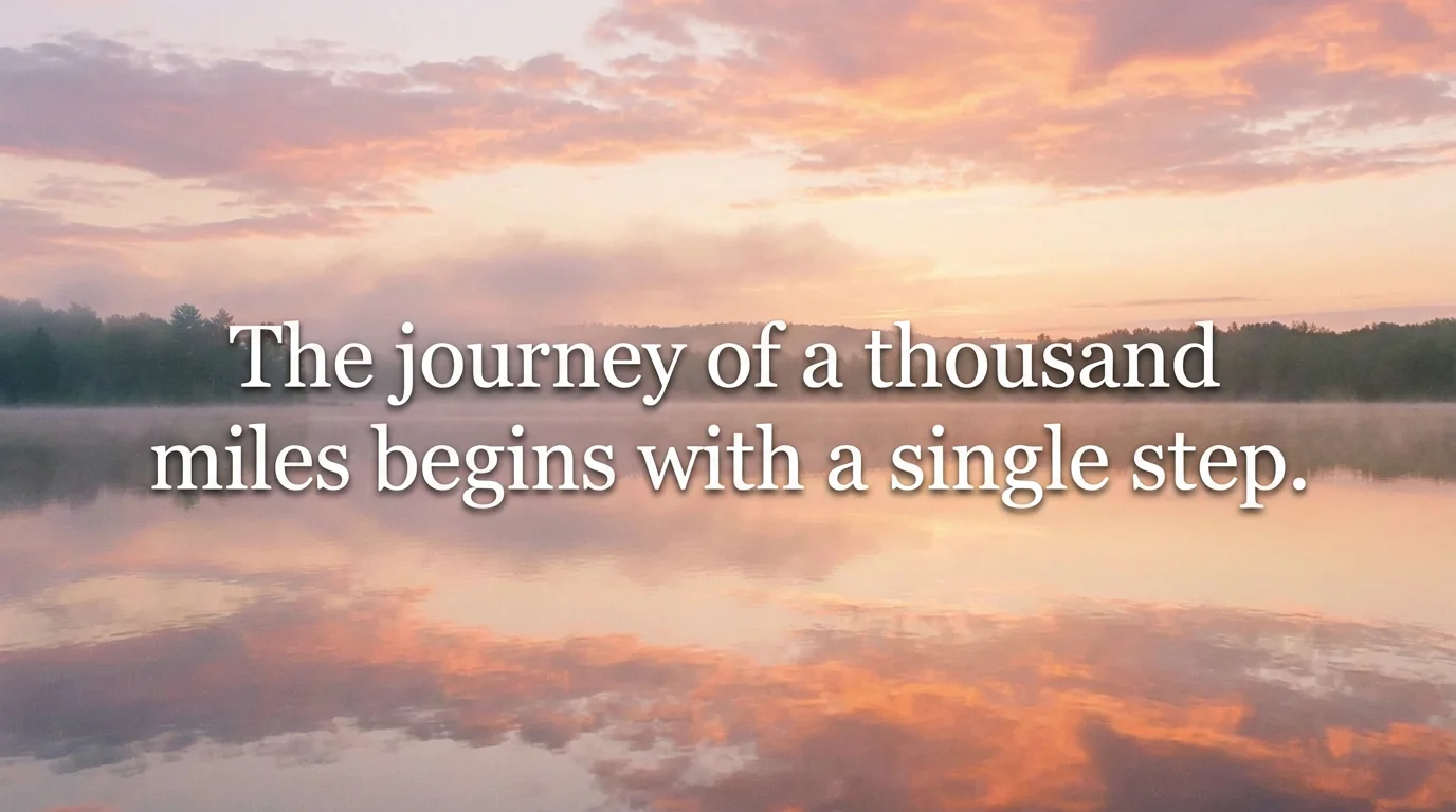 A professionally designed image of a mountain range at sunrise with the quote 'The journey of a thousand miles begins with a single step' elegantly displayed in the center.