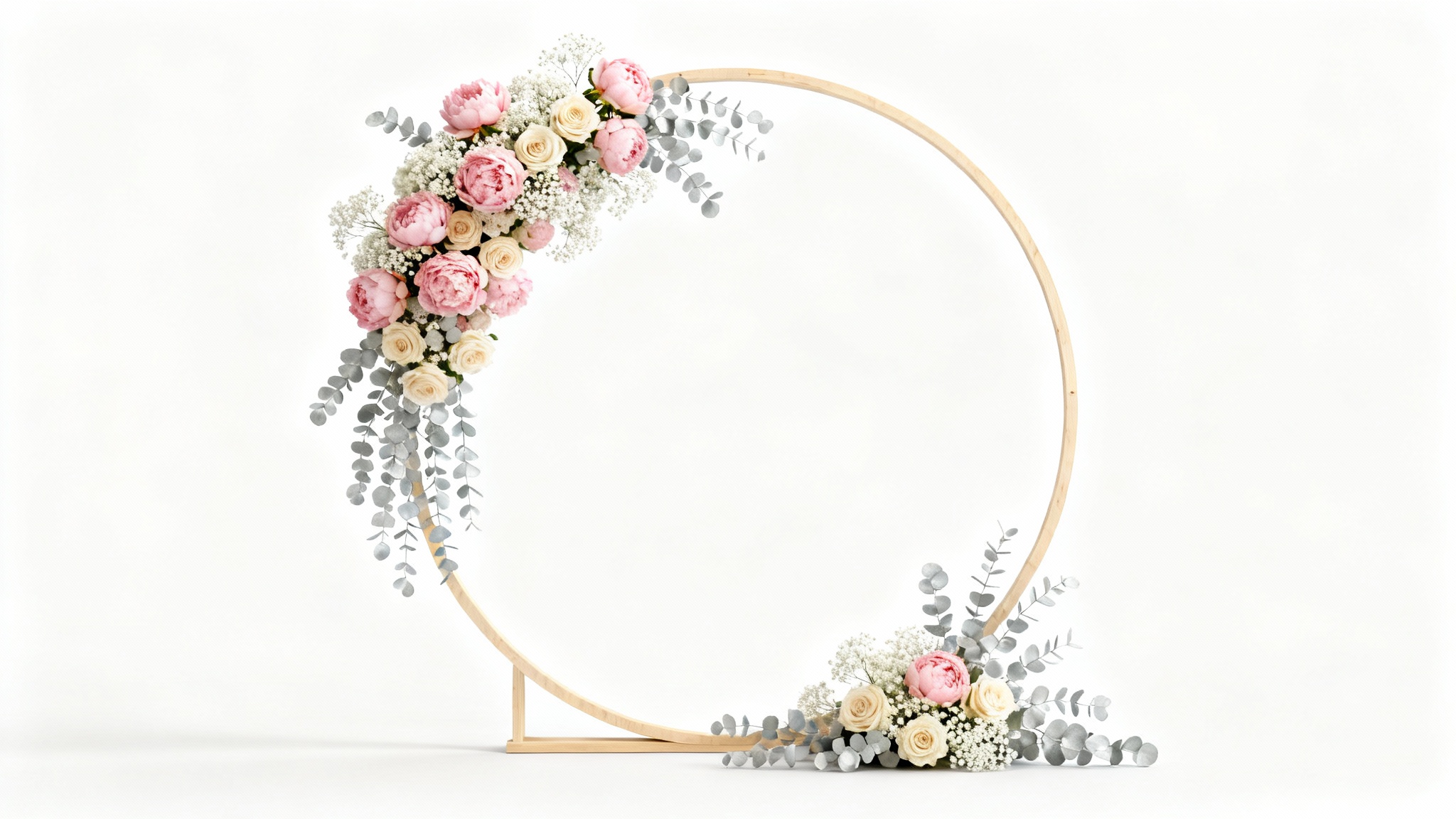 A beautiful circular wooden wedding backdrop decorated with pink and cream flowers and eucalyptus leaves, shown as a mockup against a plain white background.