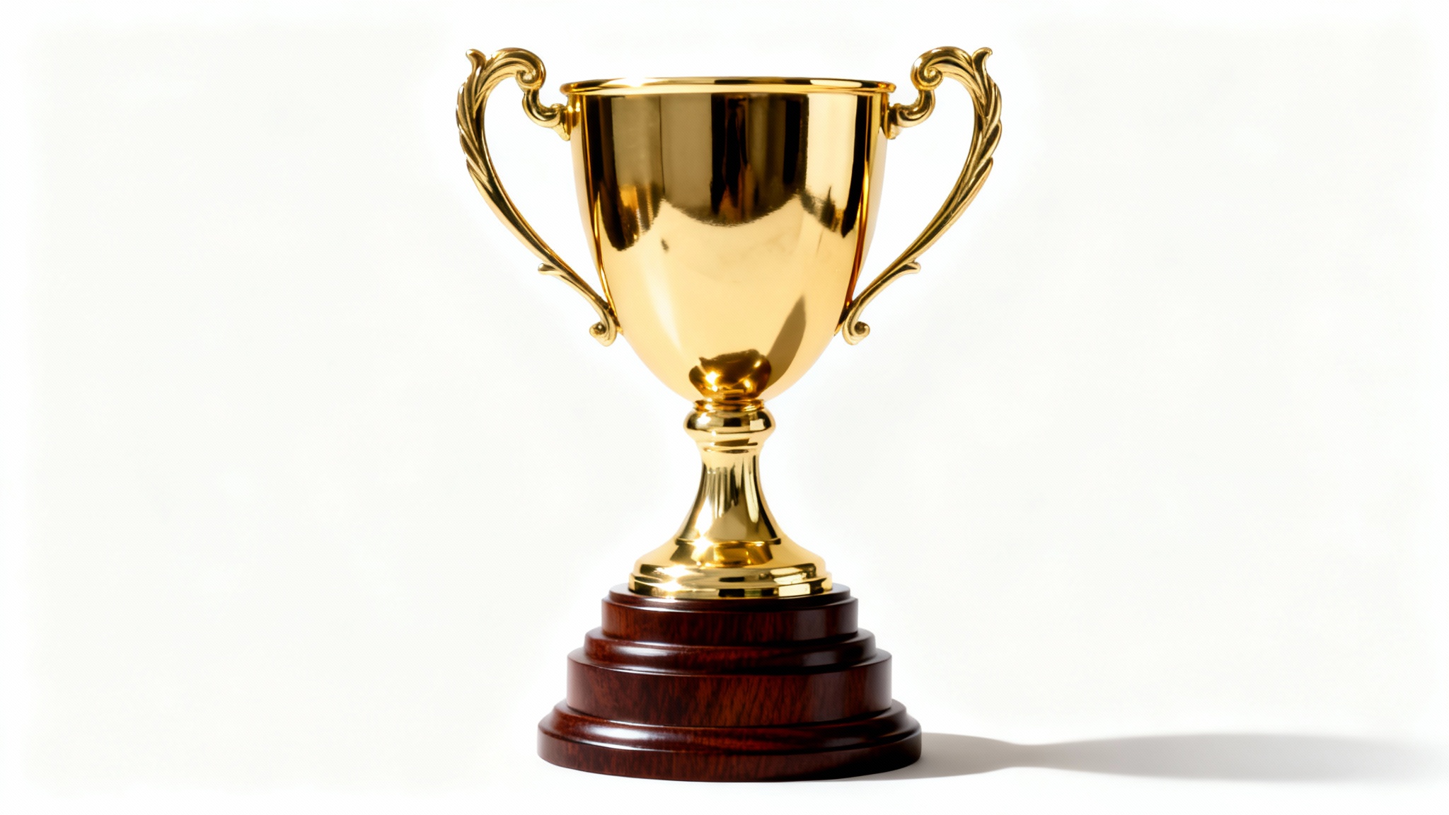 A close-up shot of a shiny gold trophy with elegant handles and a wooden base, isolated against a plain white background.
