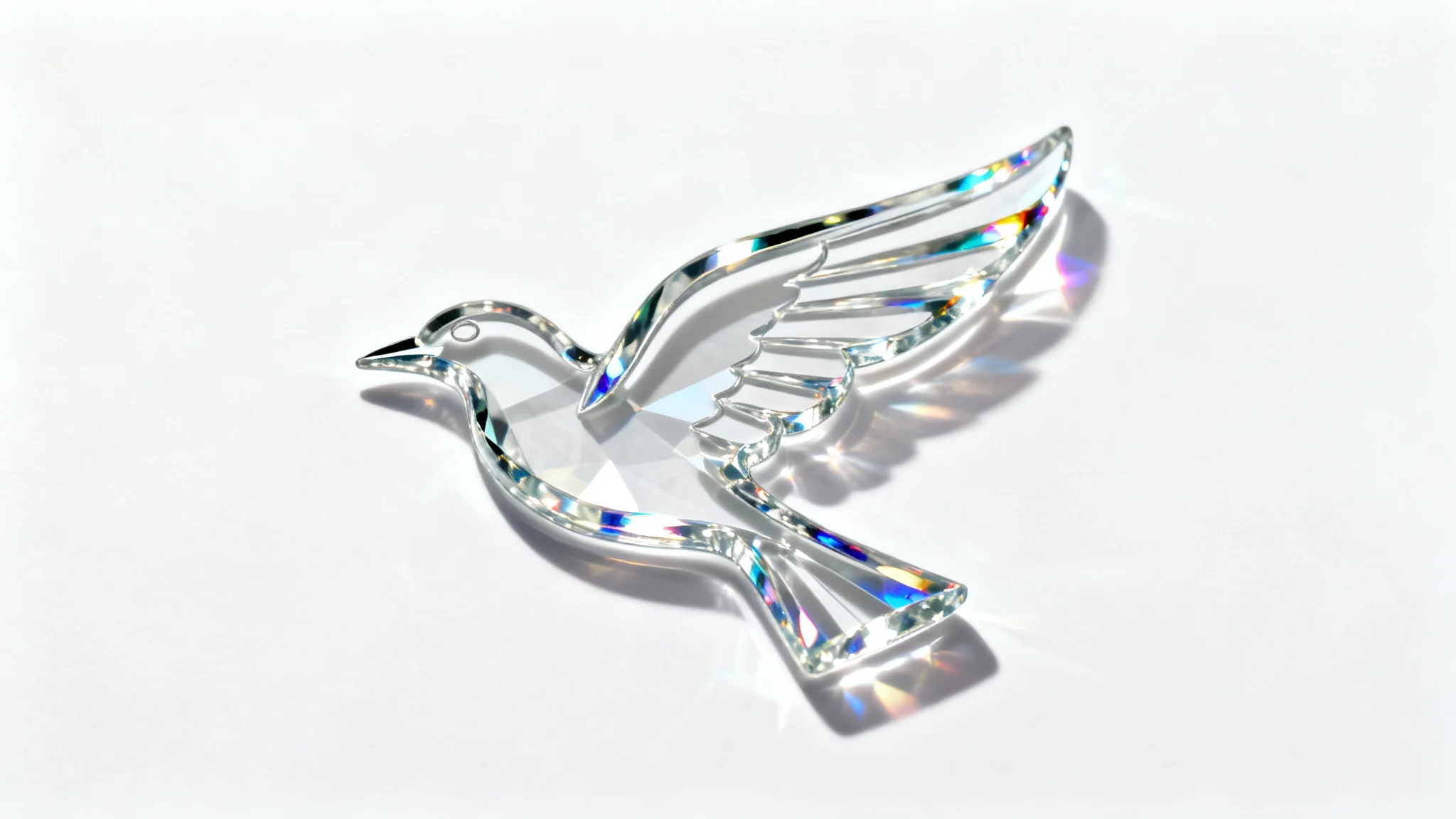 A photorealistic logo of a stylized bird made of clear, transparent glass, casting a subtle shadow on a clean white background.