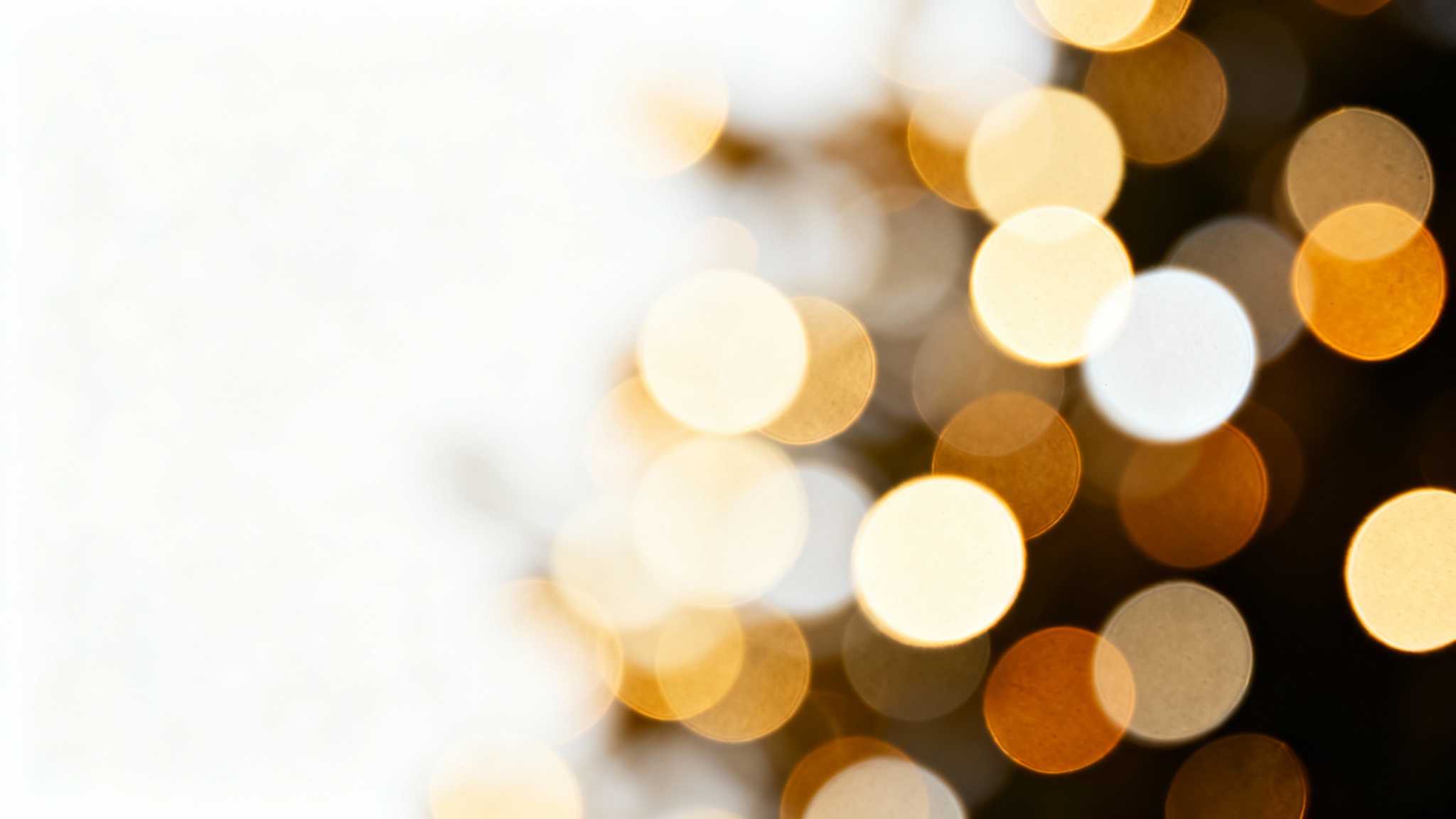 A beautiful abstract image of a bokeh overlay, featuring soft, glowing orbs of golden and white light scattered across a dark background, creating a dreamy and magical effect.