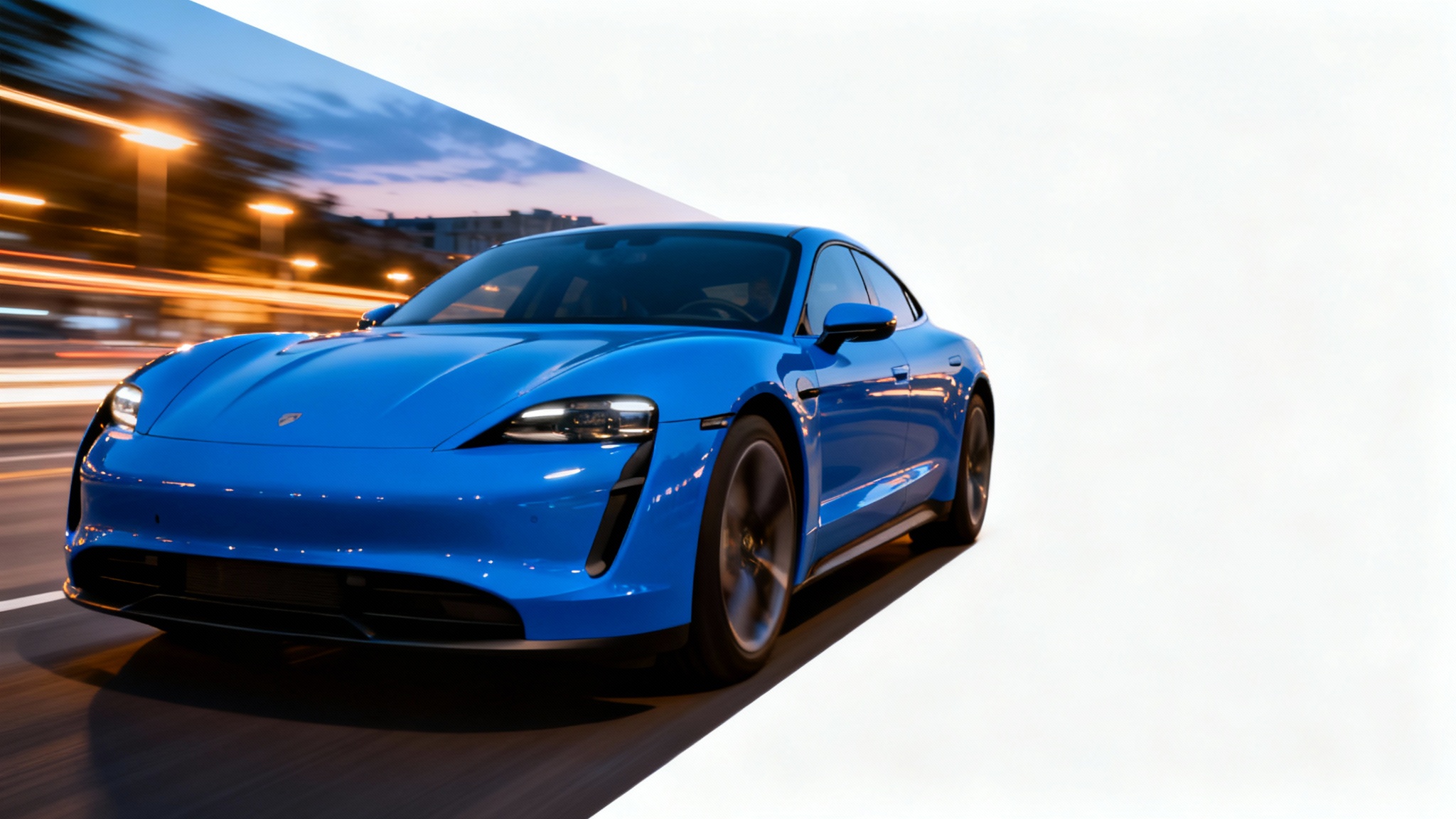 A photograph capturing a sleek electric blue sports car in motion, with the background blurred to convey high speed, set against a clean white backdrop.