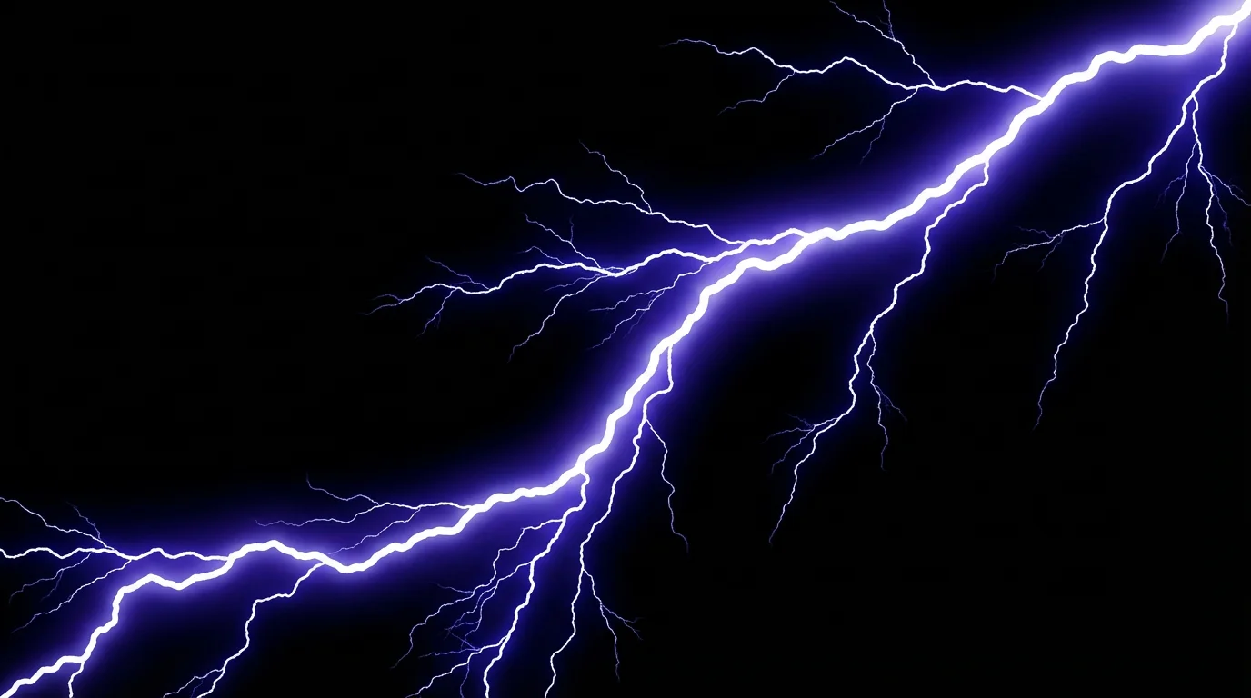 A dramatic, isolated image of a single, large forking lightning bolt against a solid black background, crackling with electric blue and white energy.