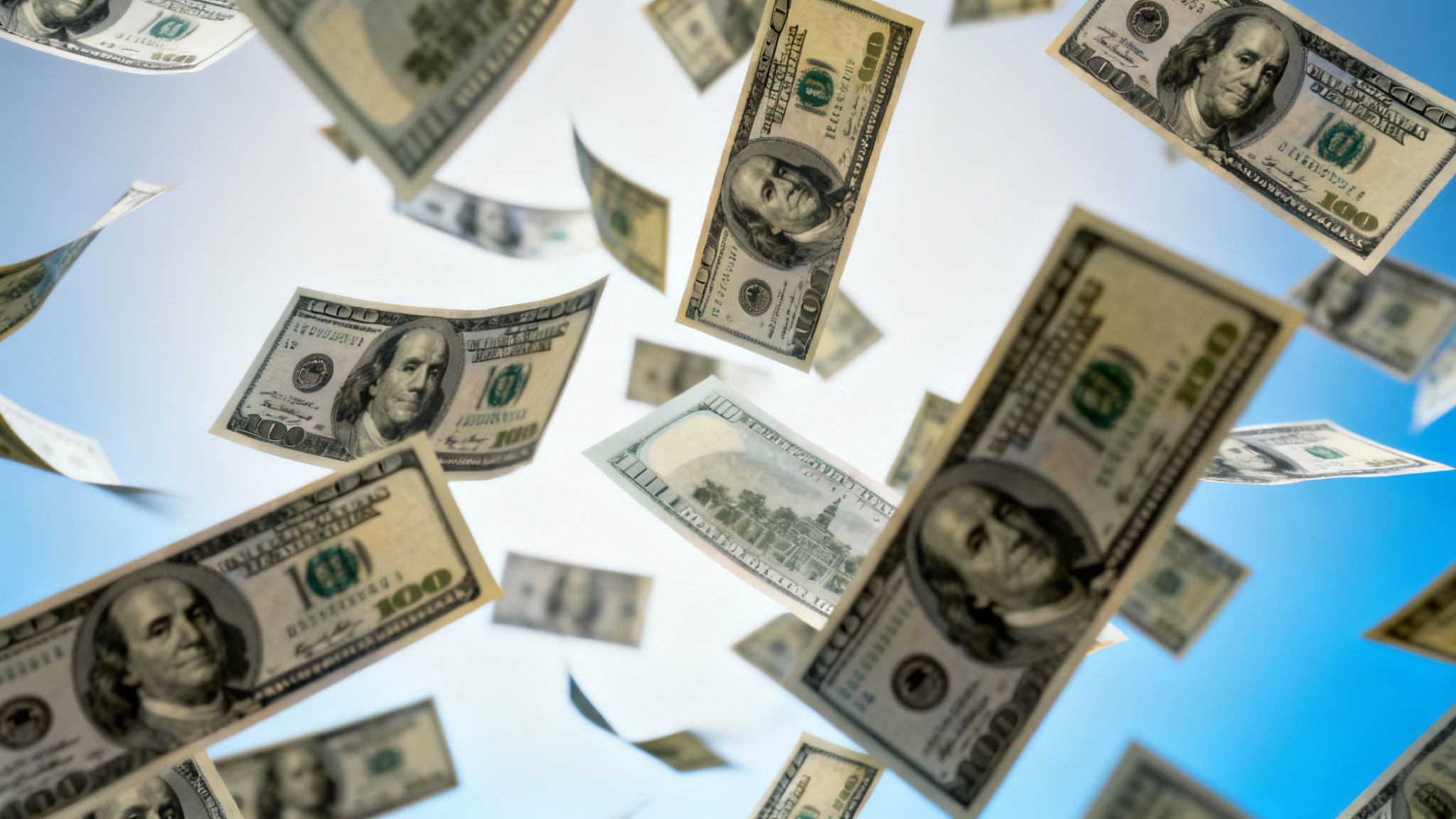 A visually striking image showing a large amount of hundred-dollar bills raining down against a clean, bright background, demonstrating a 'money raining' effect.