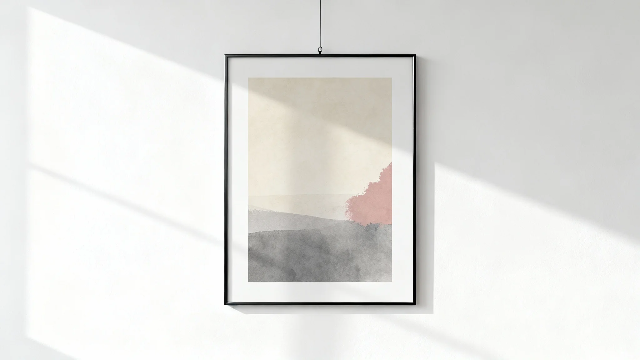 A minimalist mockup featuring a single black vertical frame with an abstract art print, hanging on a plain white wall, illuminated by soft side lighting.