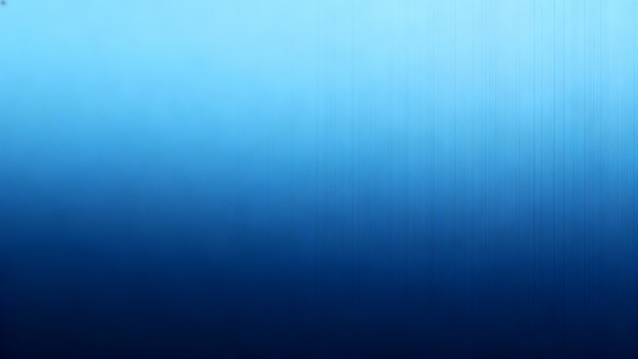 A minimal background featuring a smooth vertical gradient from dark navy blue to light sky blue, with a subtle texture.