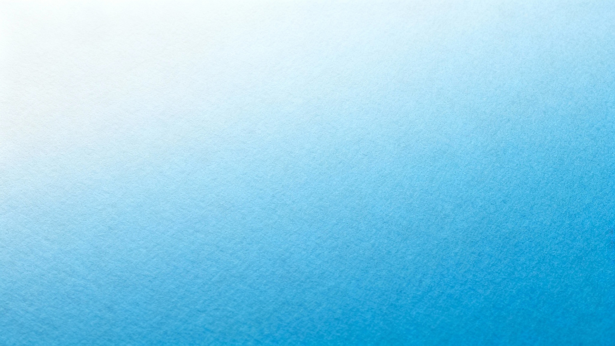 A minimal blue background with a soft gradient from light to medium blue, featuring a subtle, fine texture for a clean and modern look.