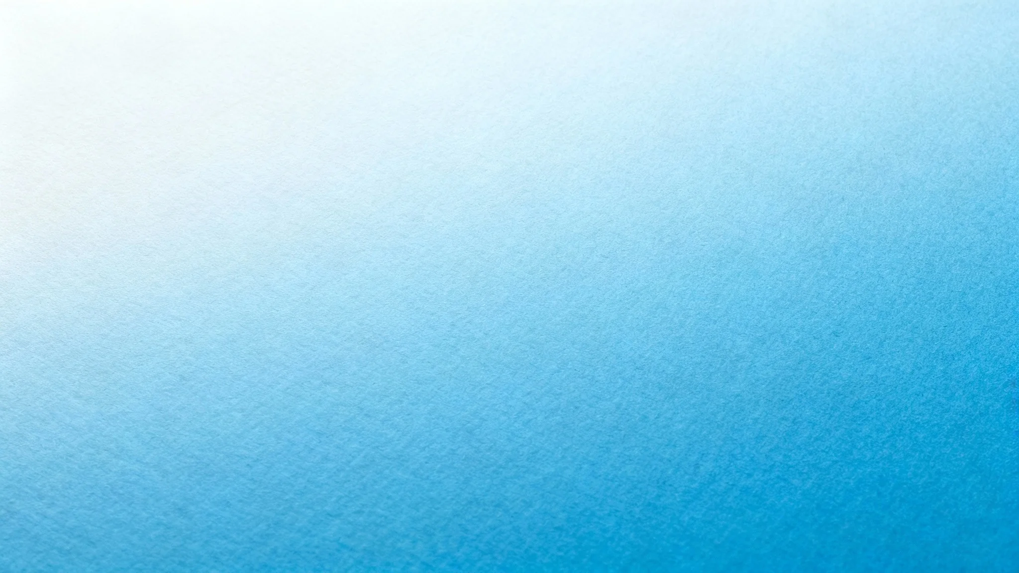 A minimal blue background with a soft gradient from light to medium blue, featuring a subtle, fine texture for a clean and modern look.