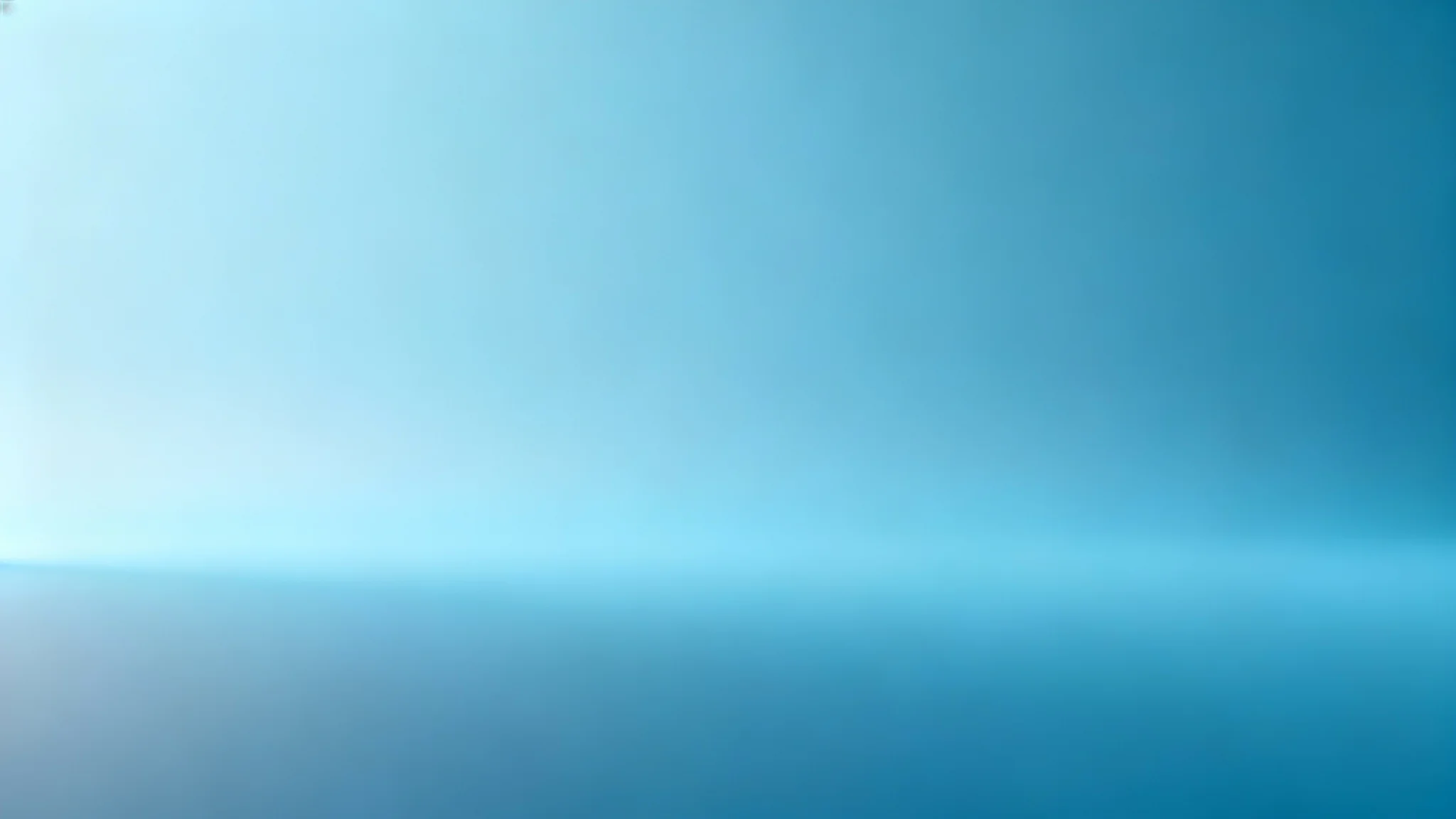 A minimal background featuring a soft gradient of light blue, creating a calm, clean, and modern aesthetic.
